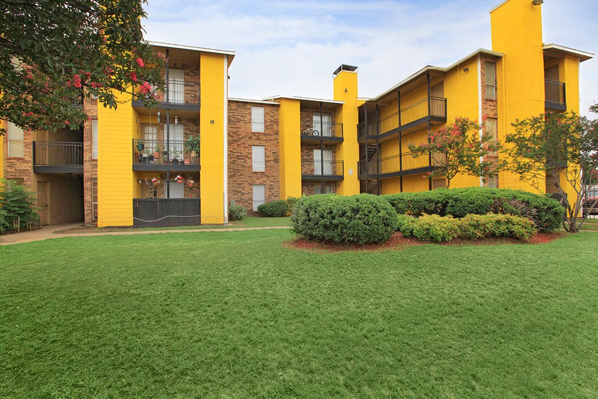 a large lawn in front of a house