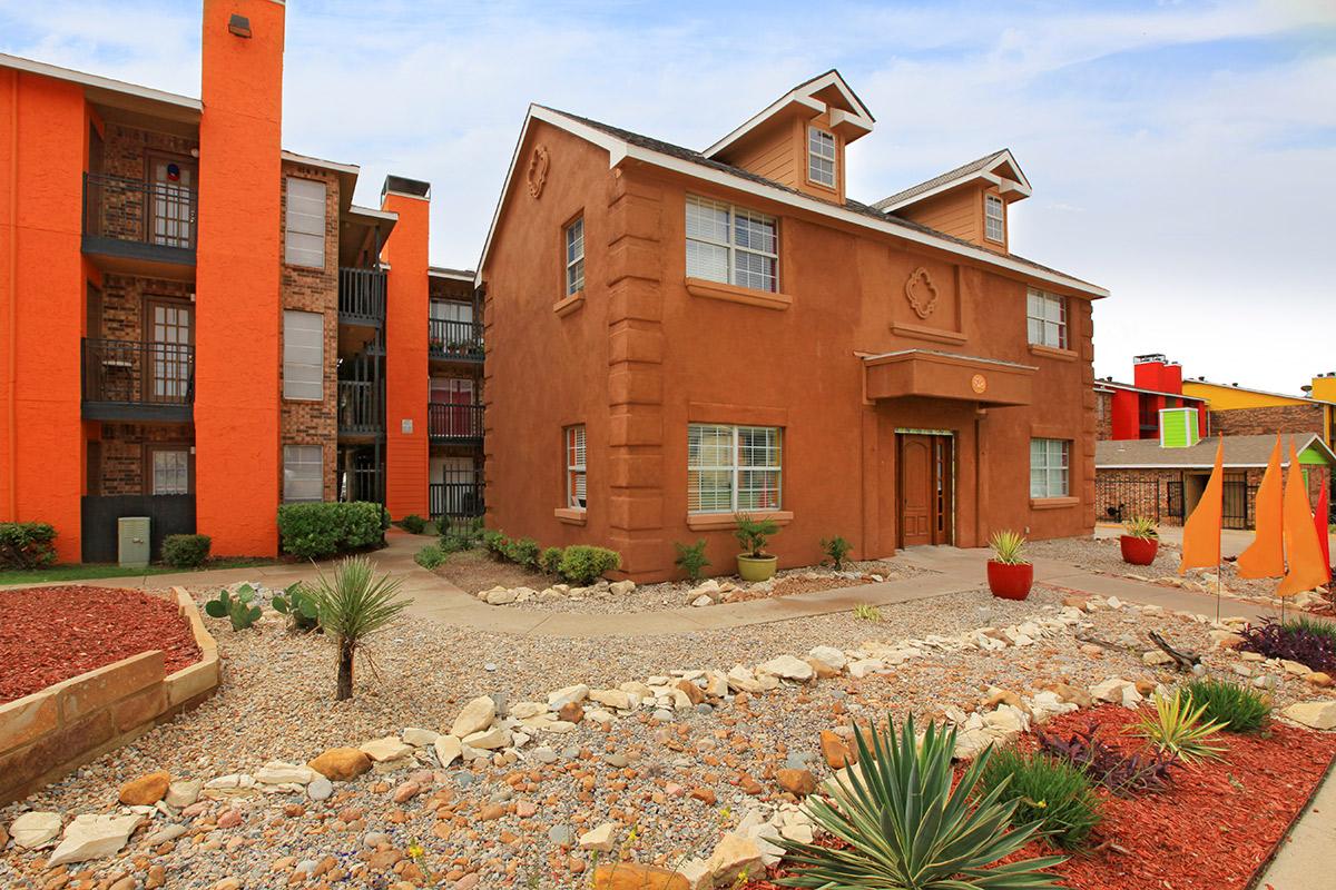 a house that is parked on the side of a building