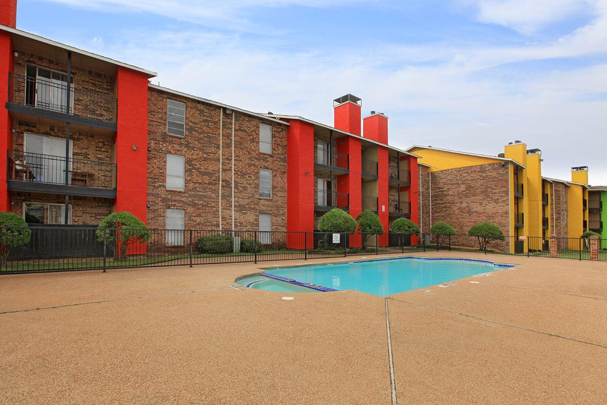 a pool next to a building