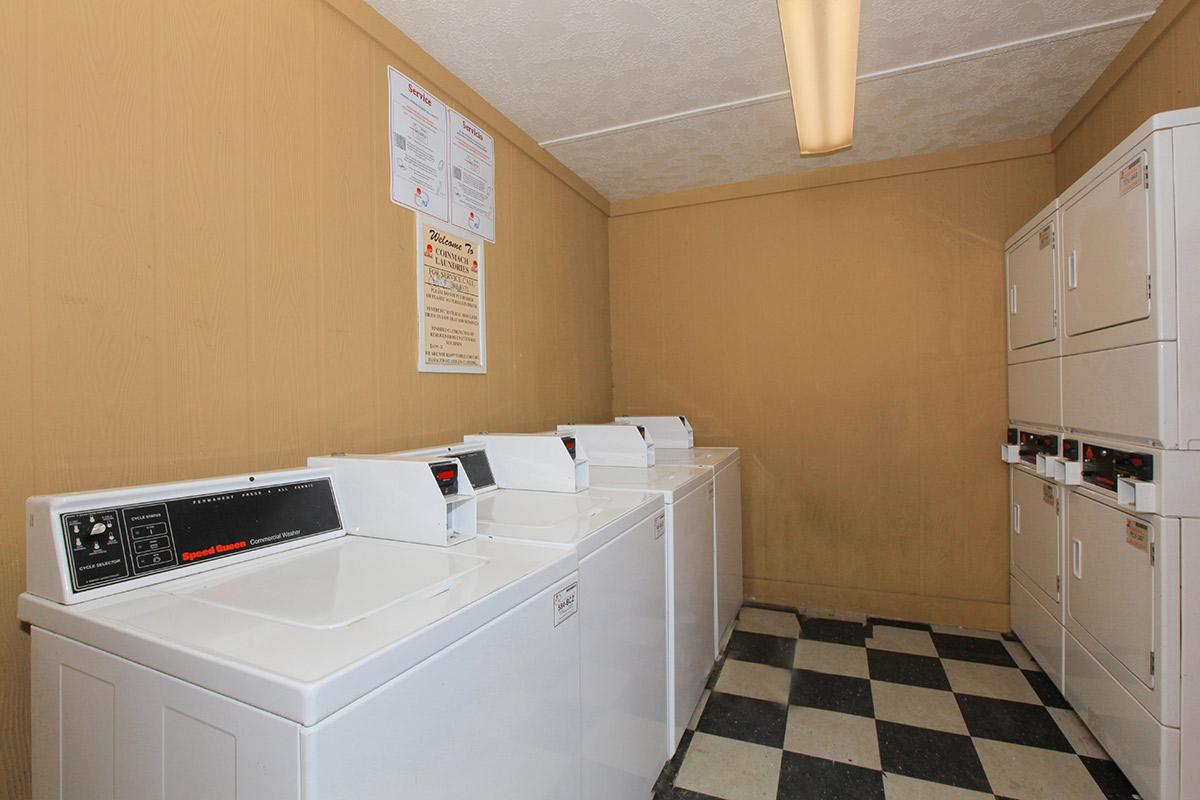 a white refrigerator freezer sitting inside of a kitchen