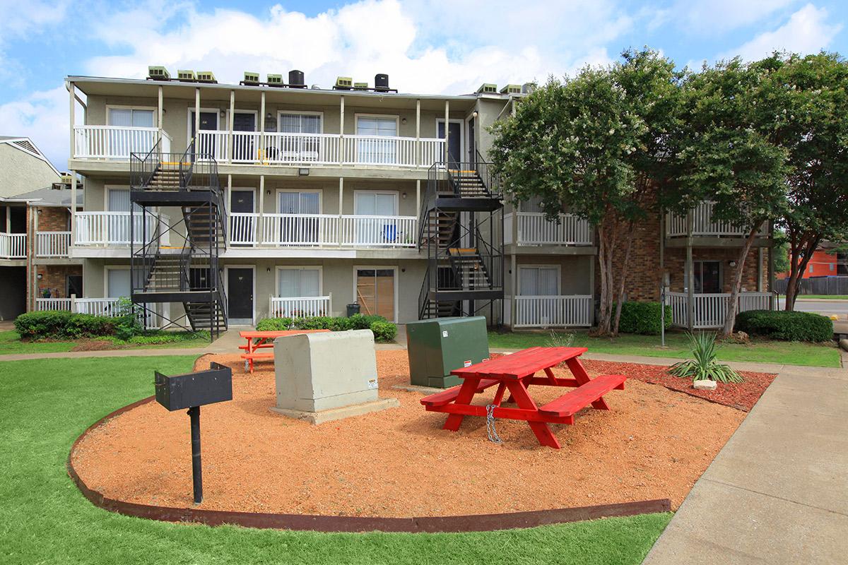 a large lawn in front of a building