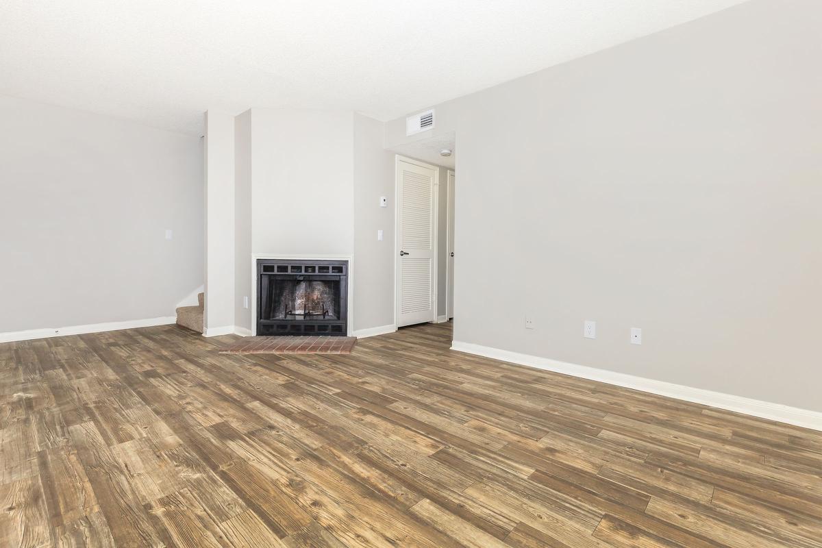 Vinyl wood floored living room with fireplace in Nashville, Tennessee.