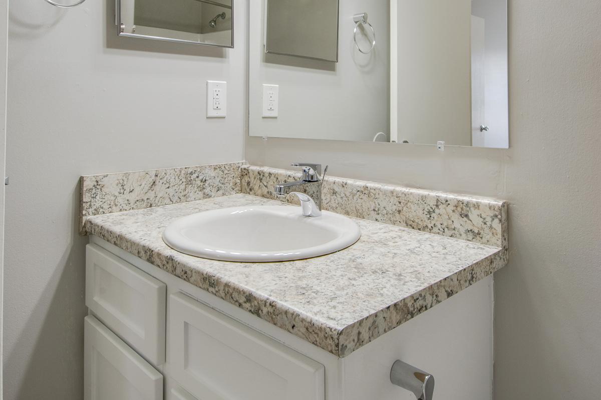 Bathroom with beautiful countertops at Hillhurst Apartments in Nashville, TN