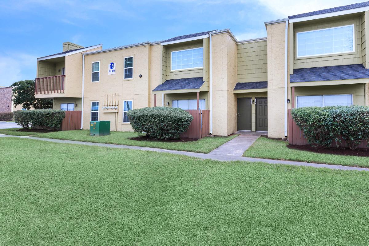 a large lawn in front of a house