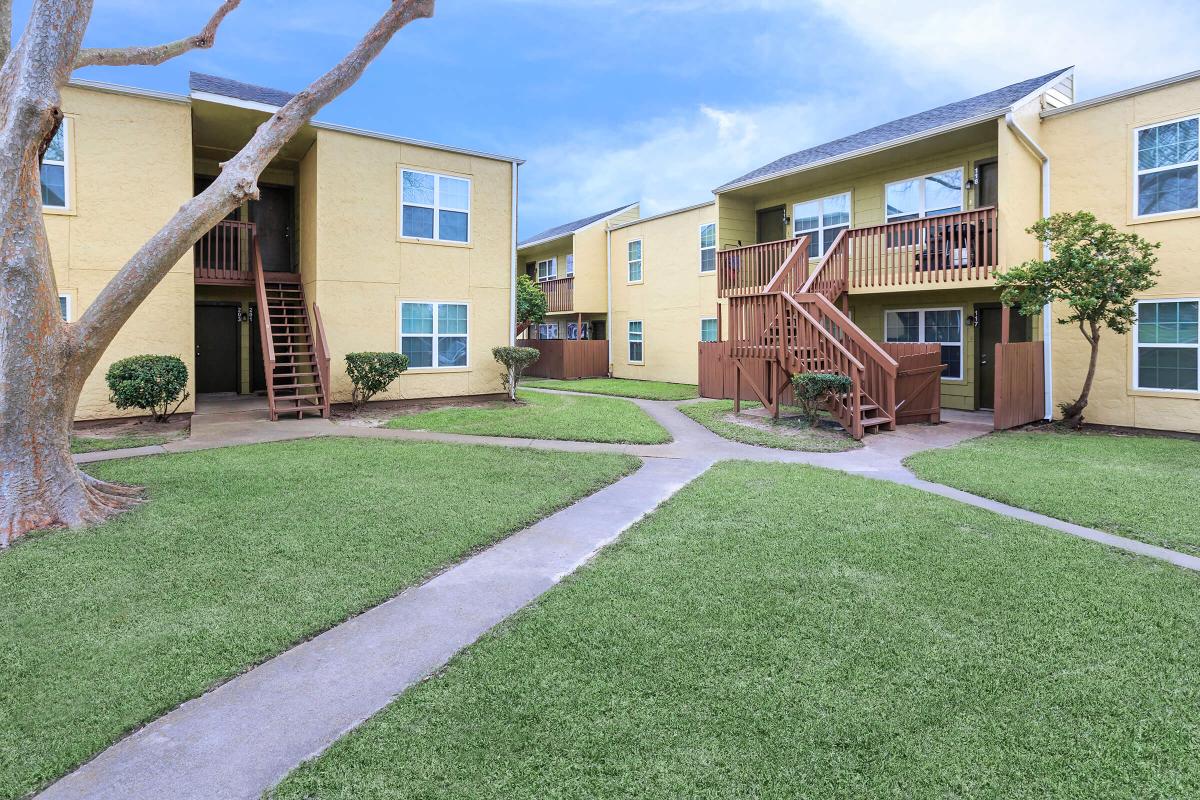 a large lawn in front of a house