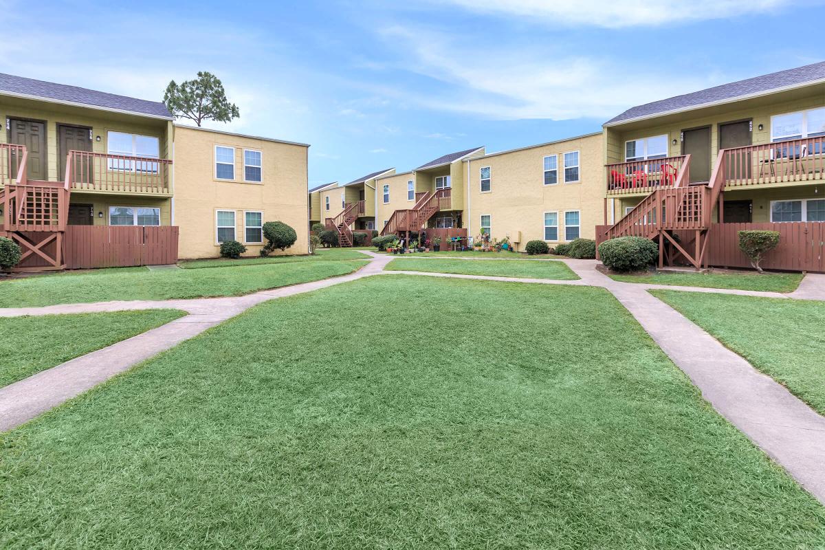 a large lawn in front of a building