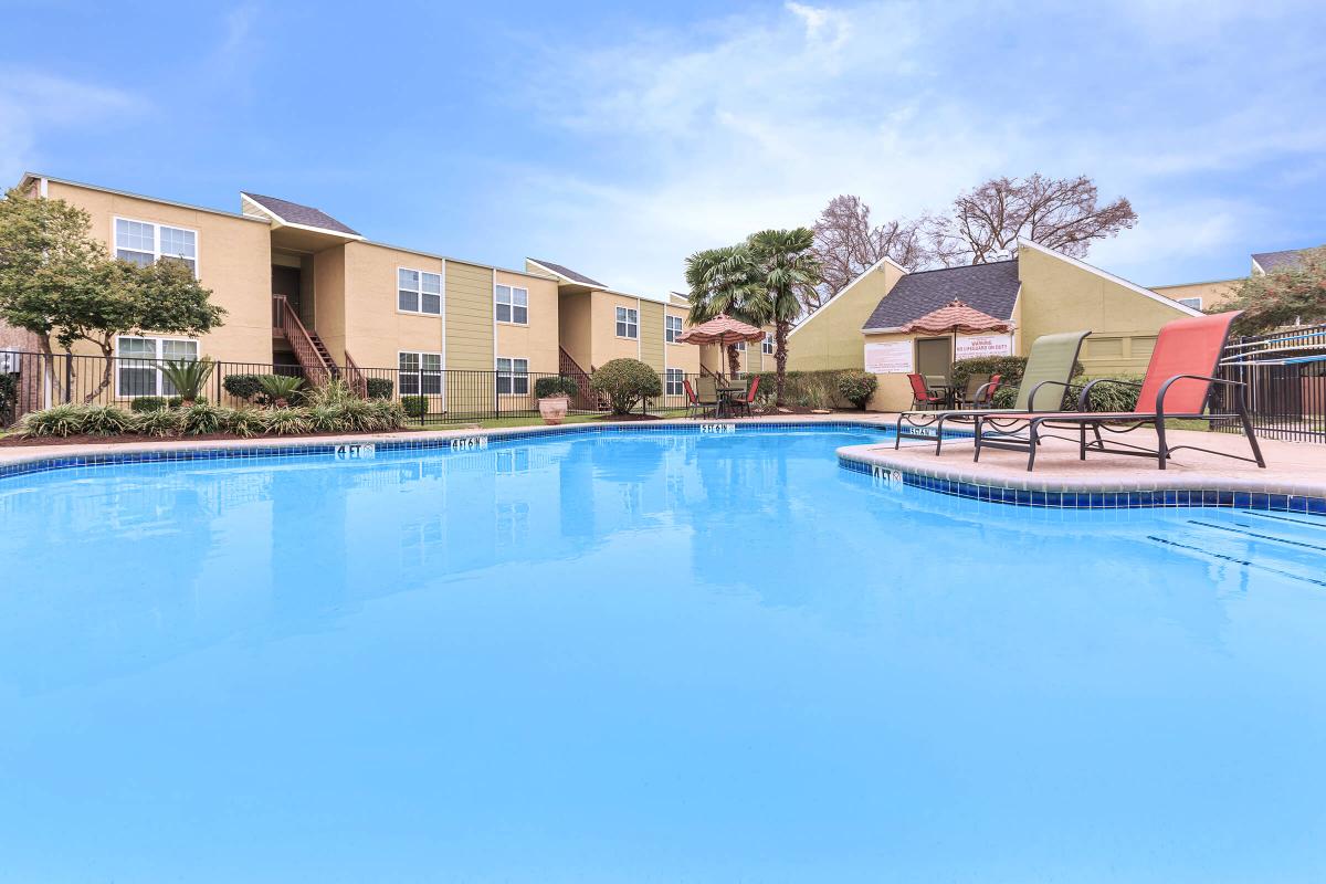 a house with a large pool of water