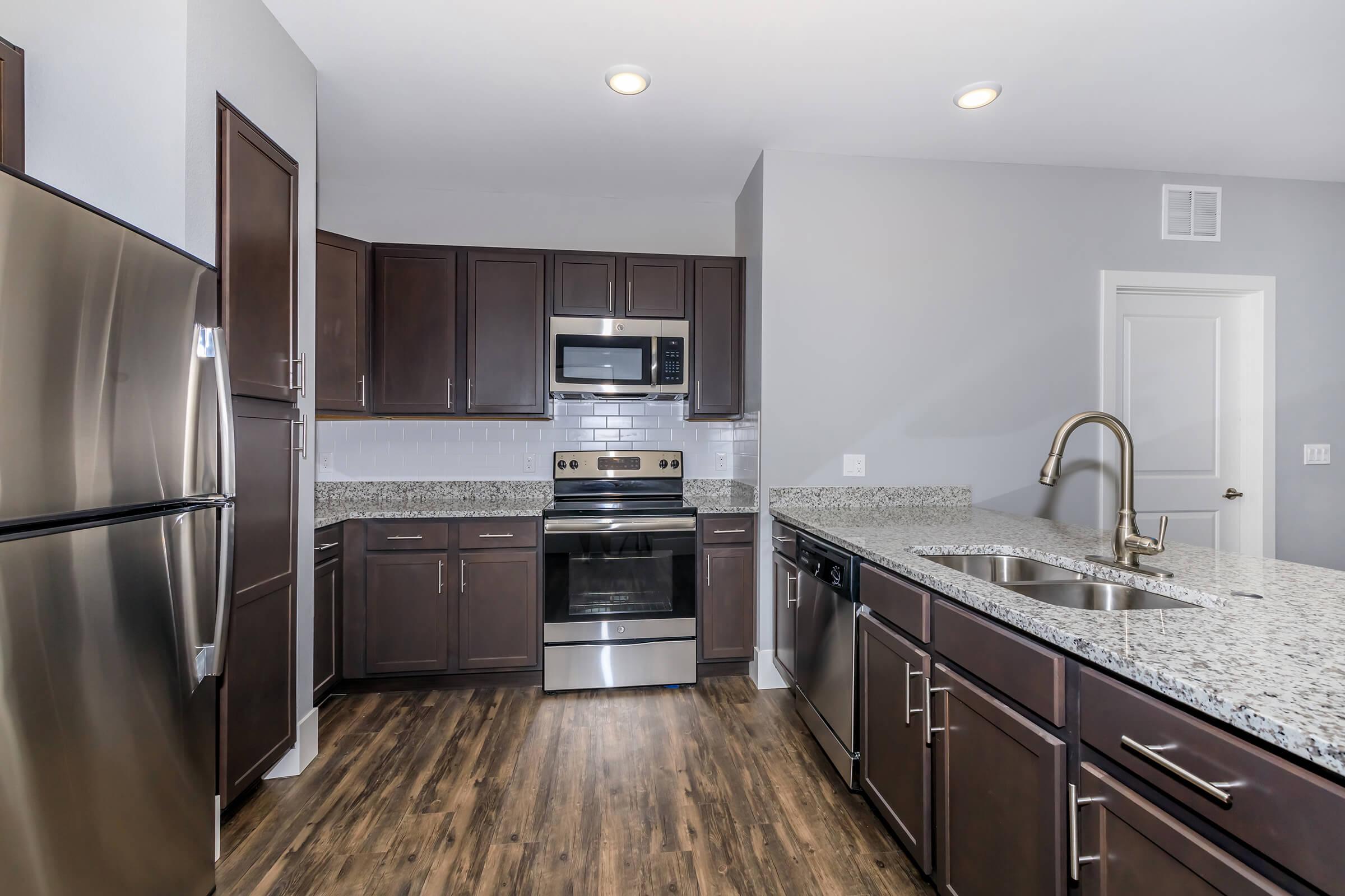 GRANITE COUNTERS AT OVERLOOK AT MESA CREEK APARTMENTS