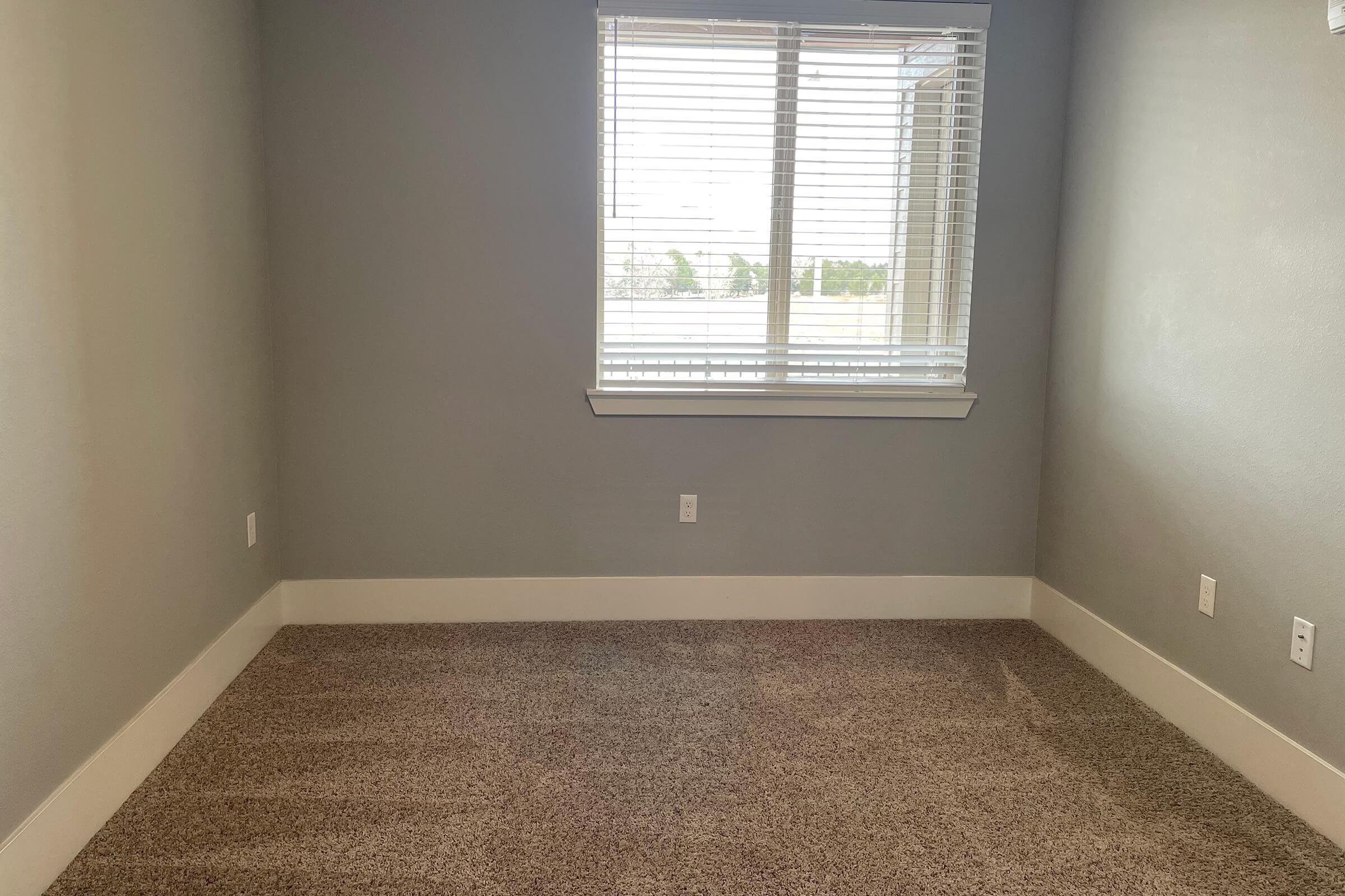 a room with a sink and a window