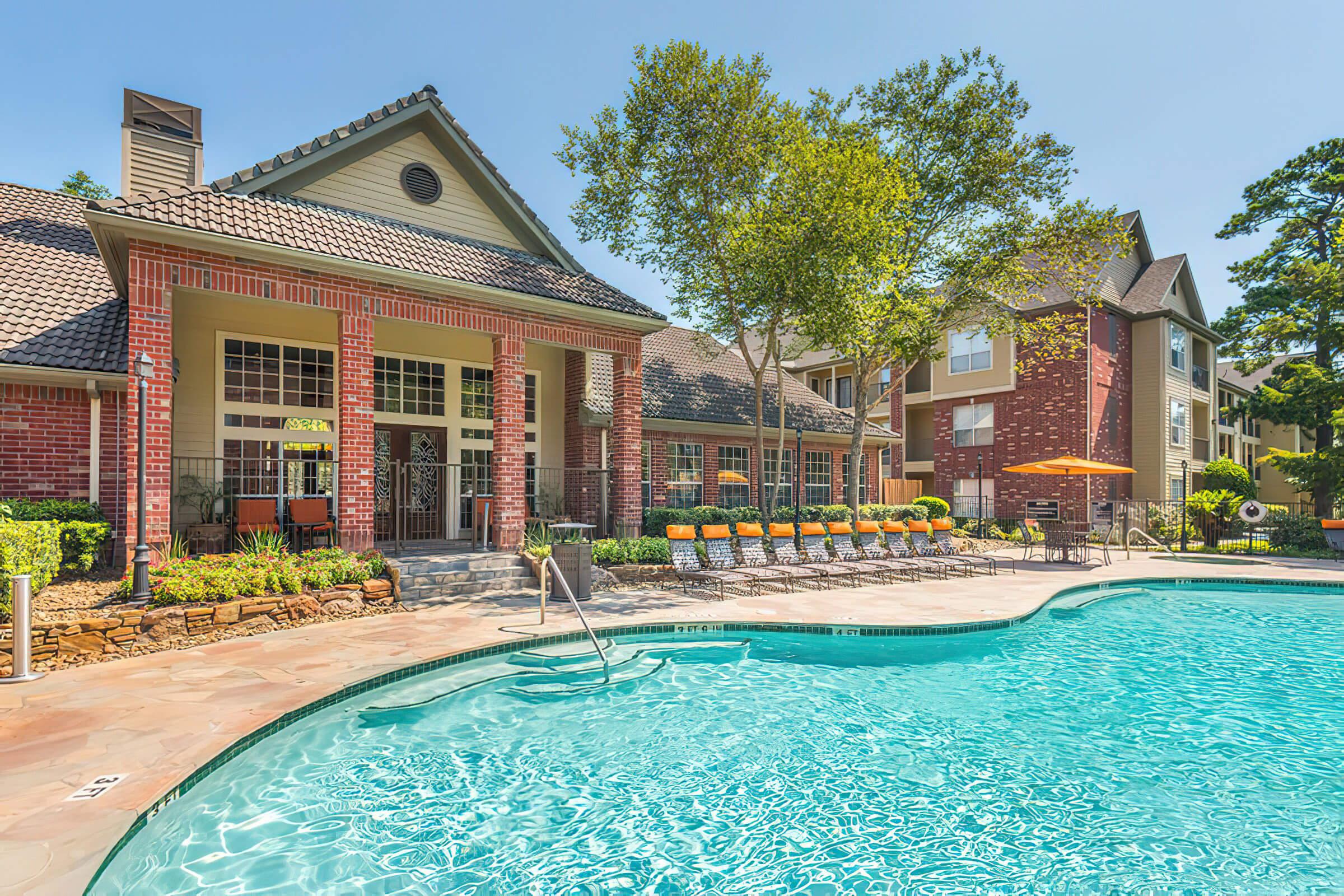 THE POOL AT WILDWOOD FOREST APARTMENTS
