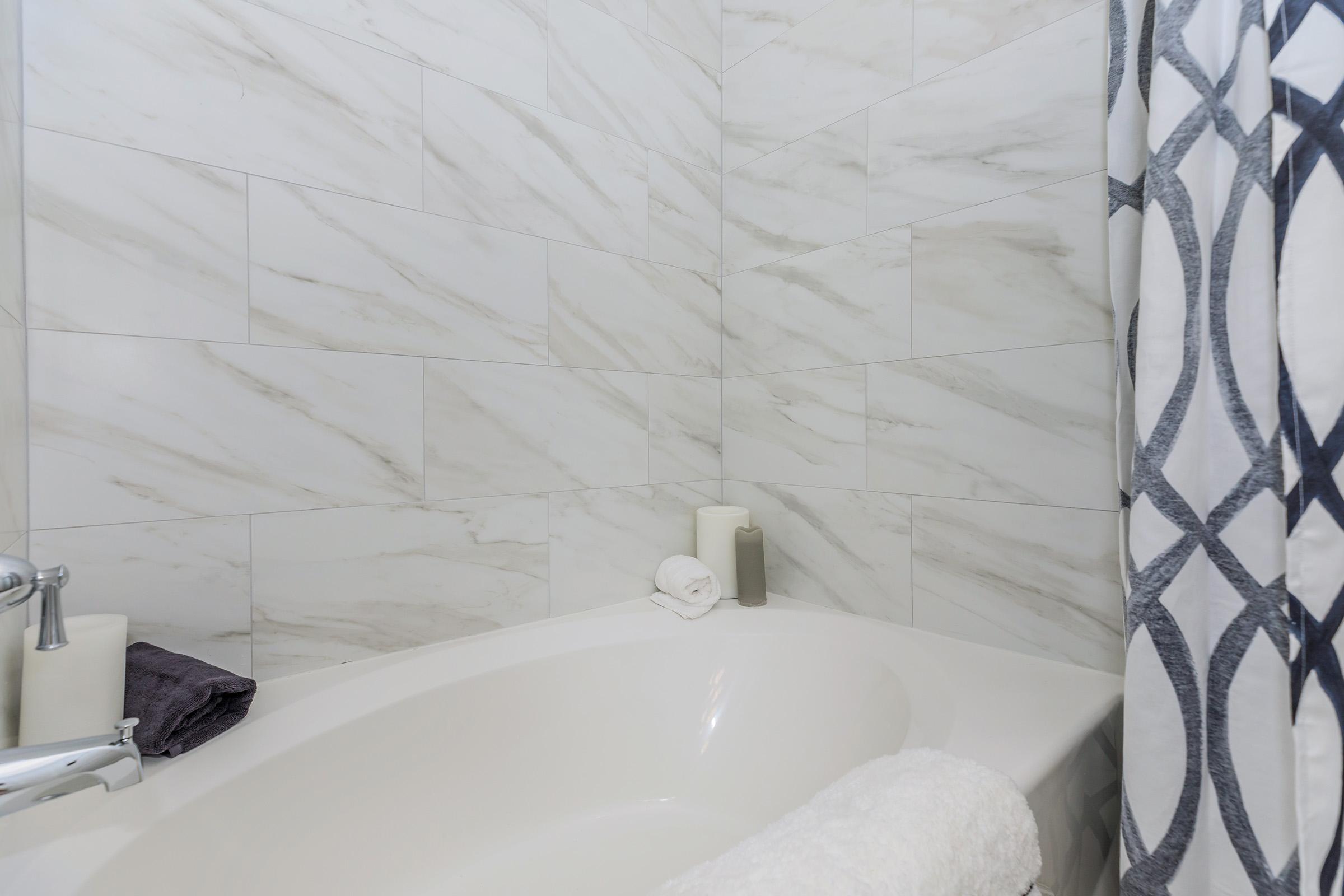 a close up of a sink and a mirror