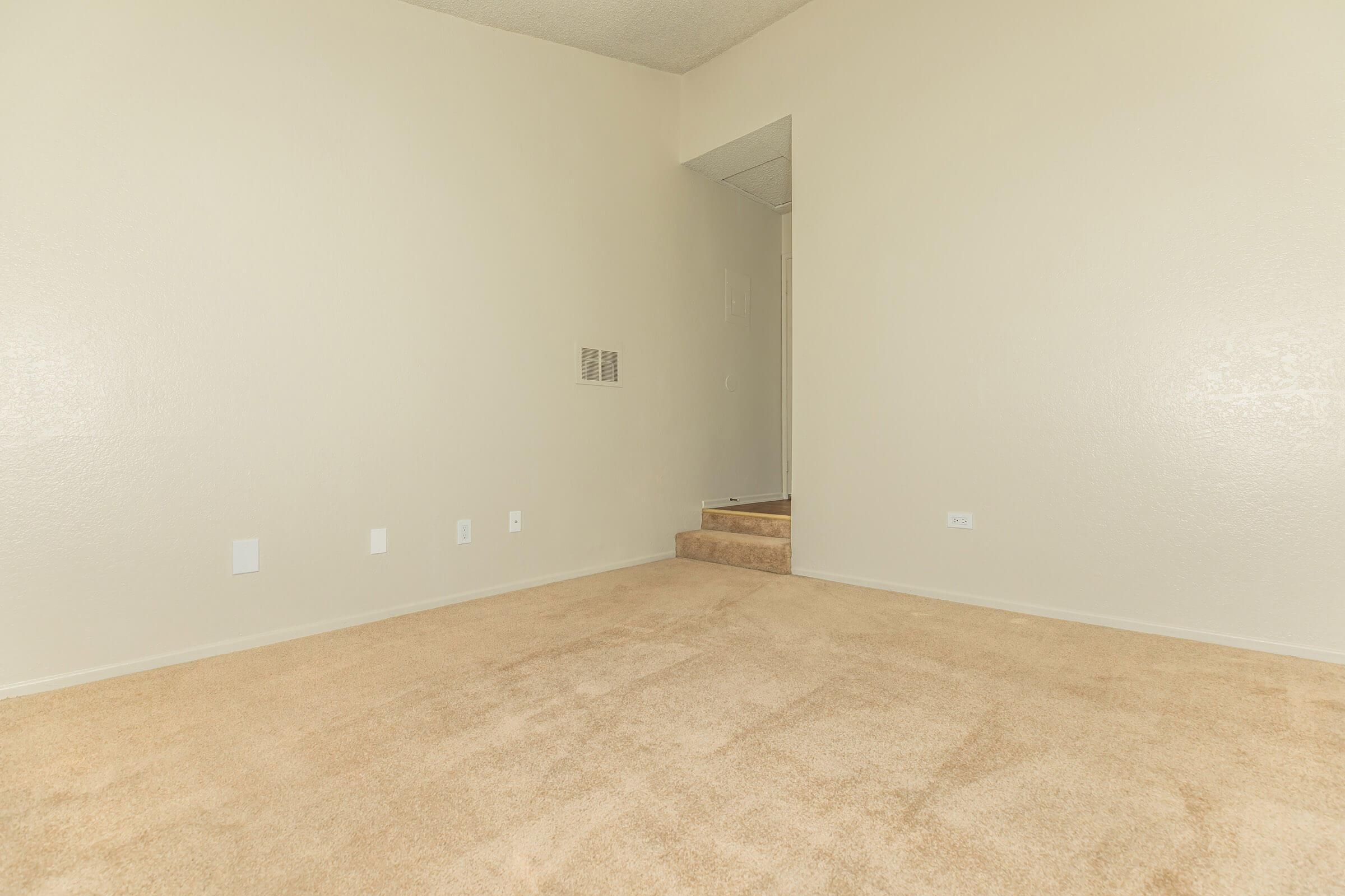 Bedroom and steps with carpet