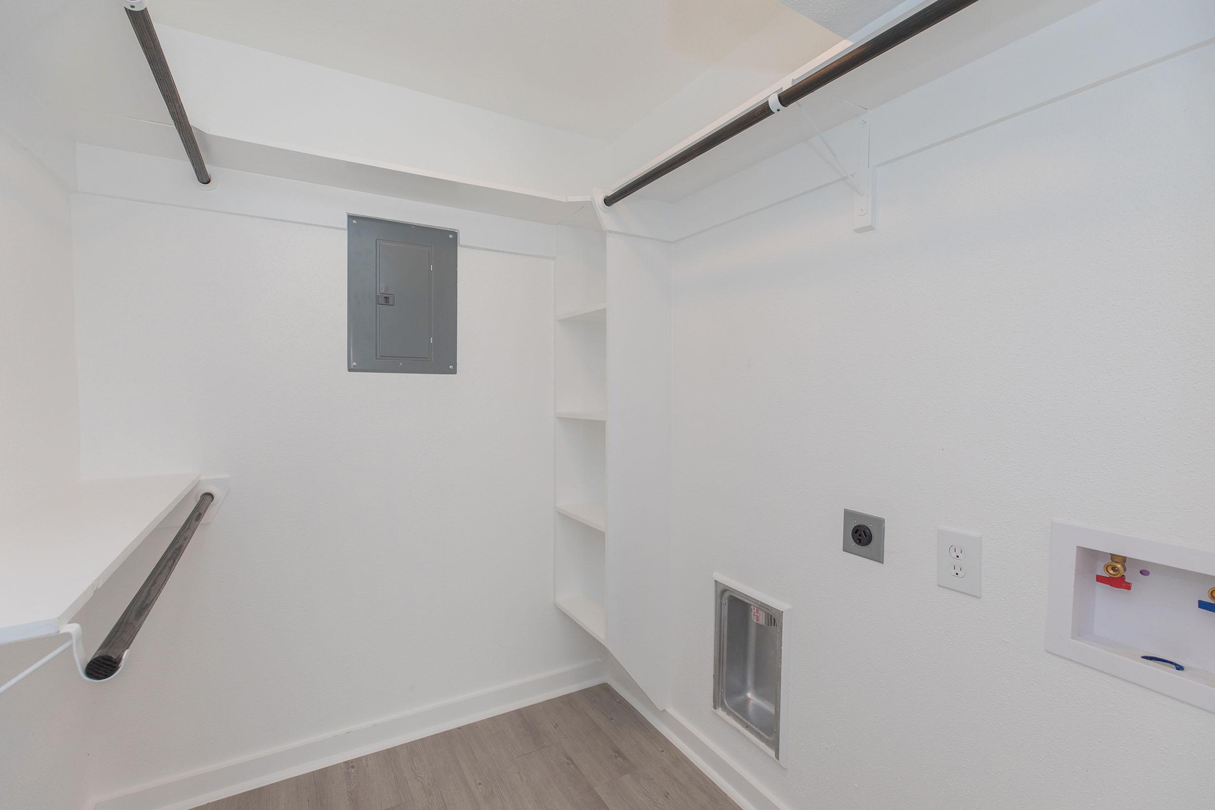 a kitchen with a sink and a refrigerator