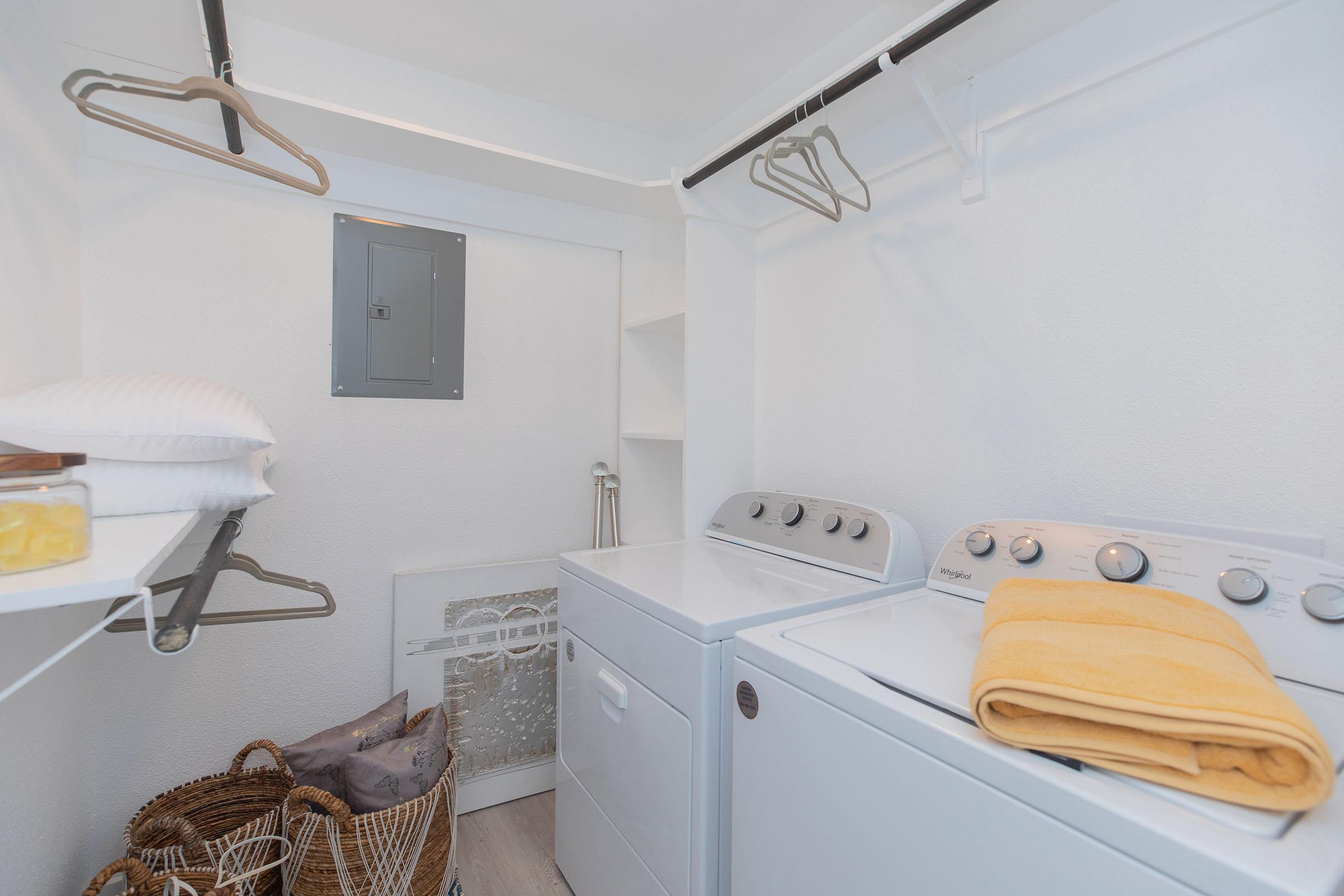 a kitchen with a sink and a mirror