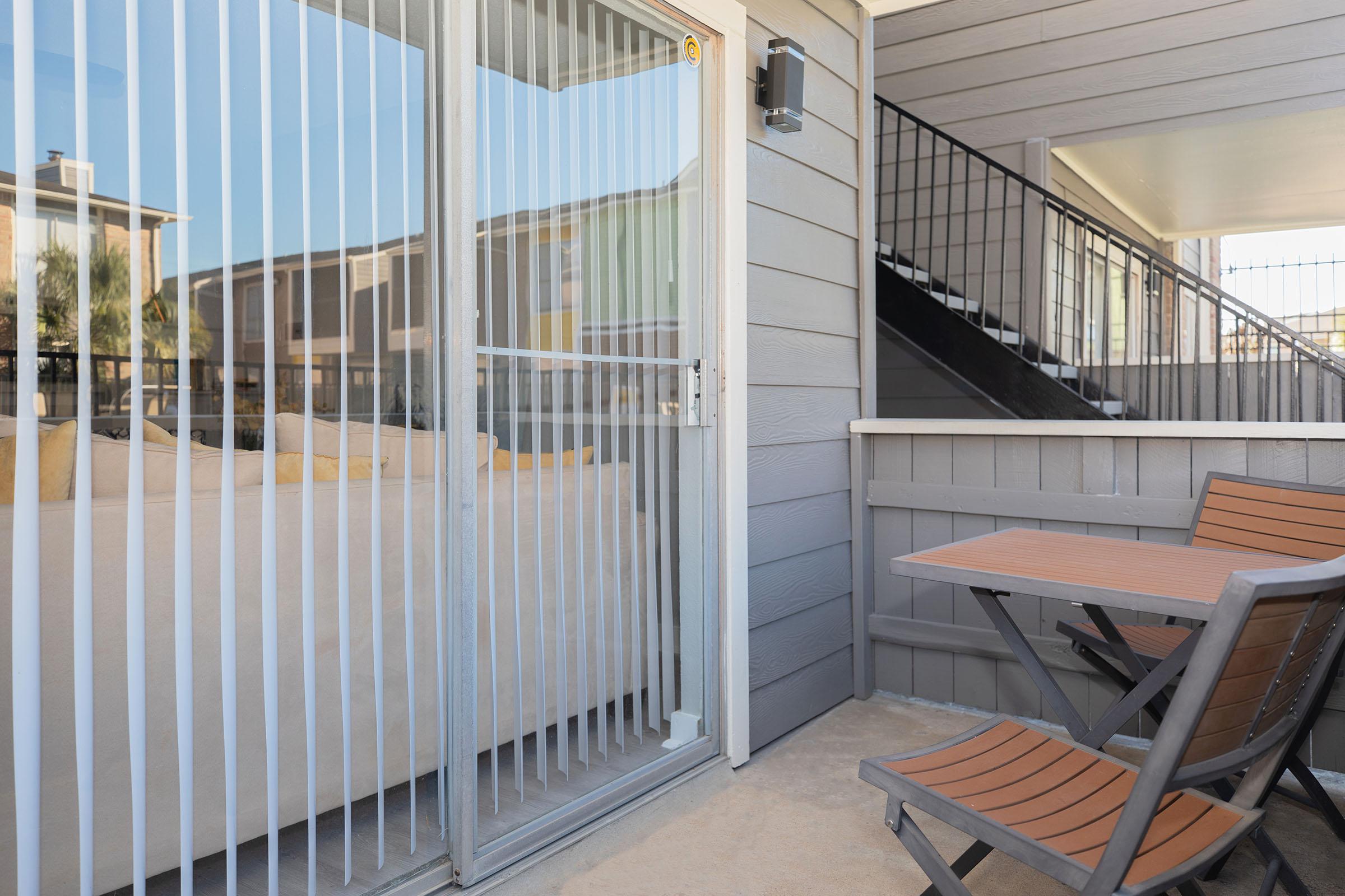 a building with a metal fence