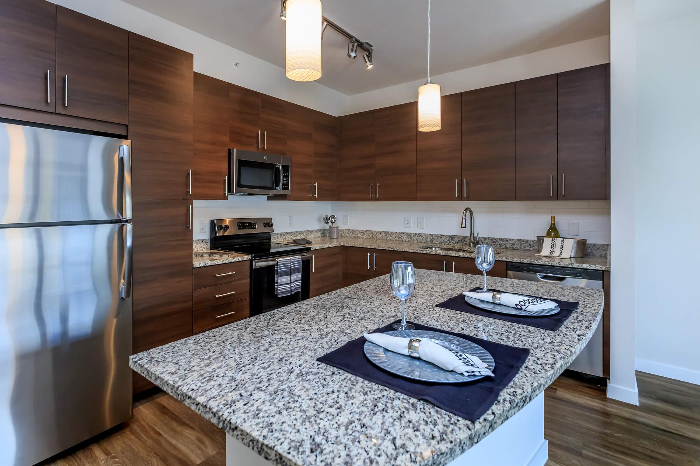 an island in the middle of a kitchen counter