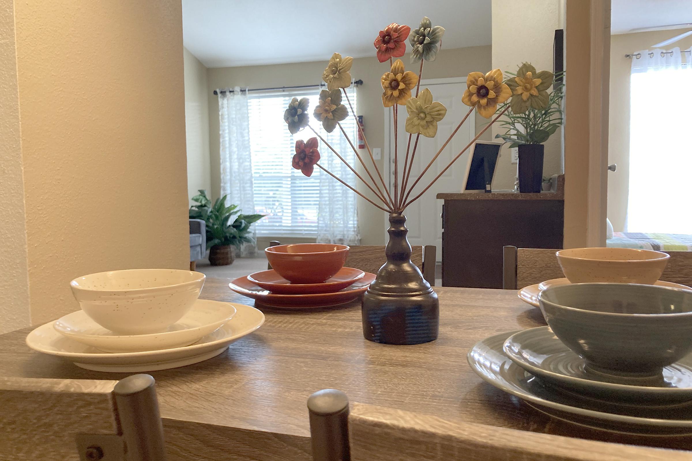 a vase of flowers on a table