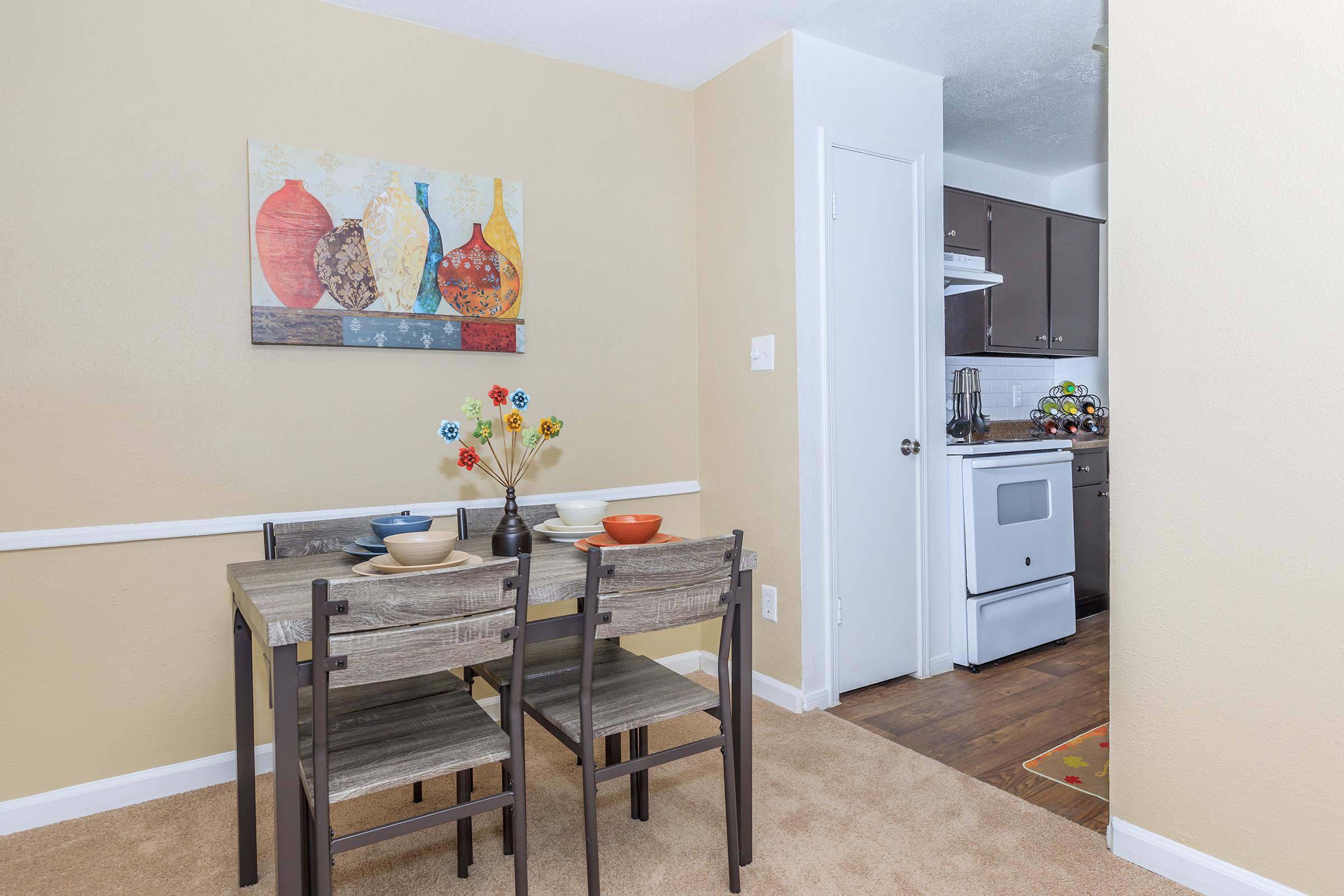 a kitchen with a sink and a refrigerator