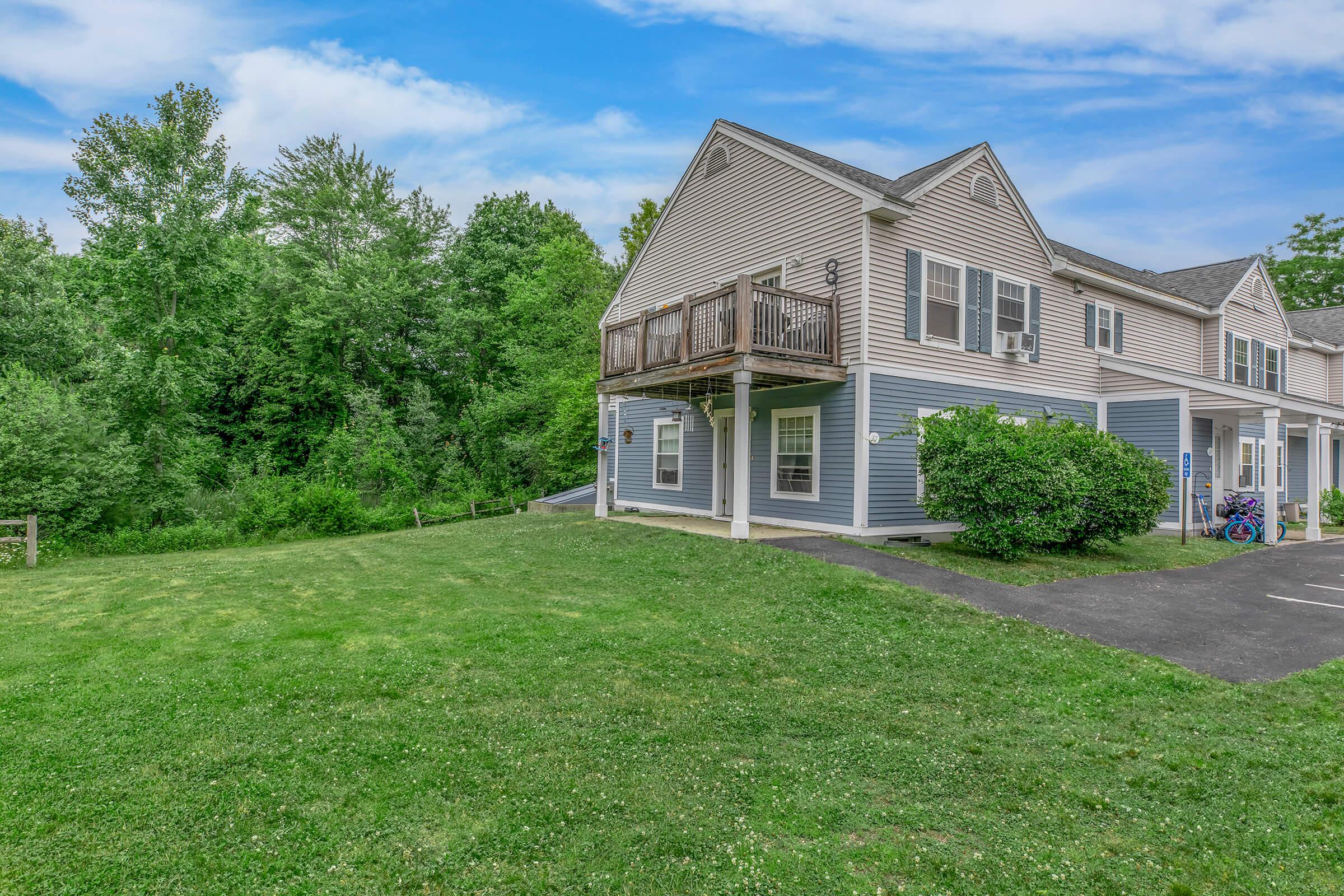 a large lawn in front of a house