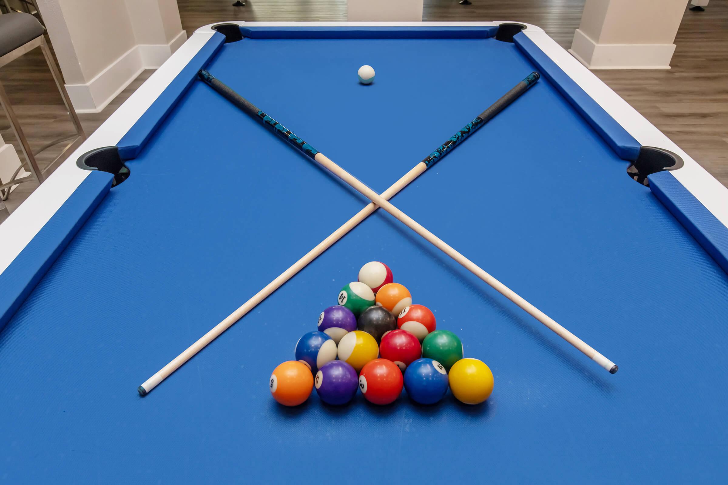 a table topped with a blue ball