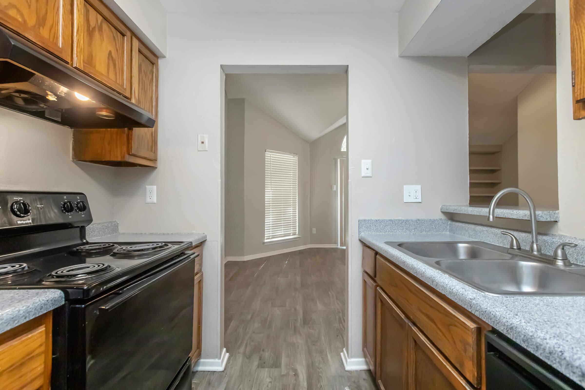 a modern kitchen with stainless steel appliances