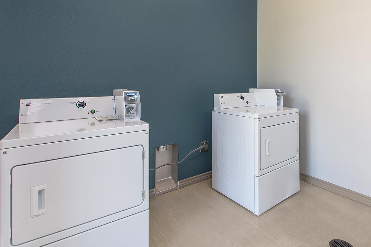 a white refrigerator freezer sitting in a room