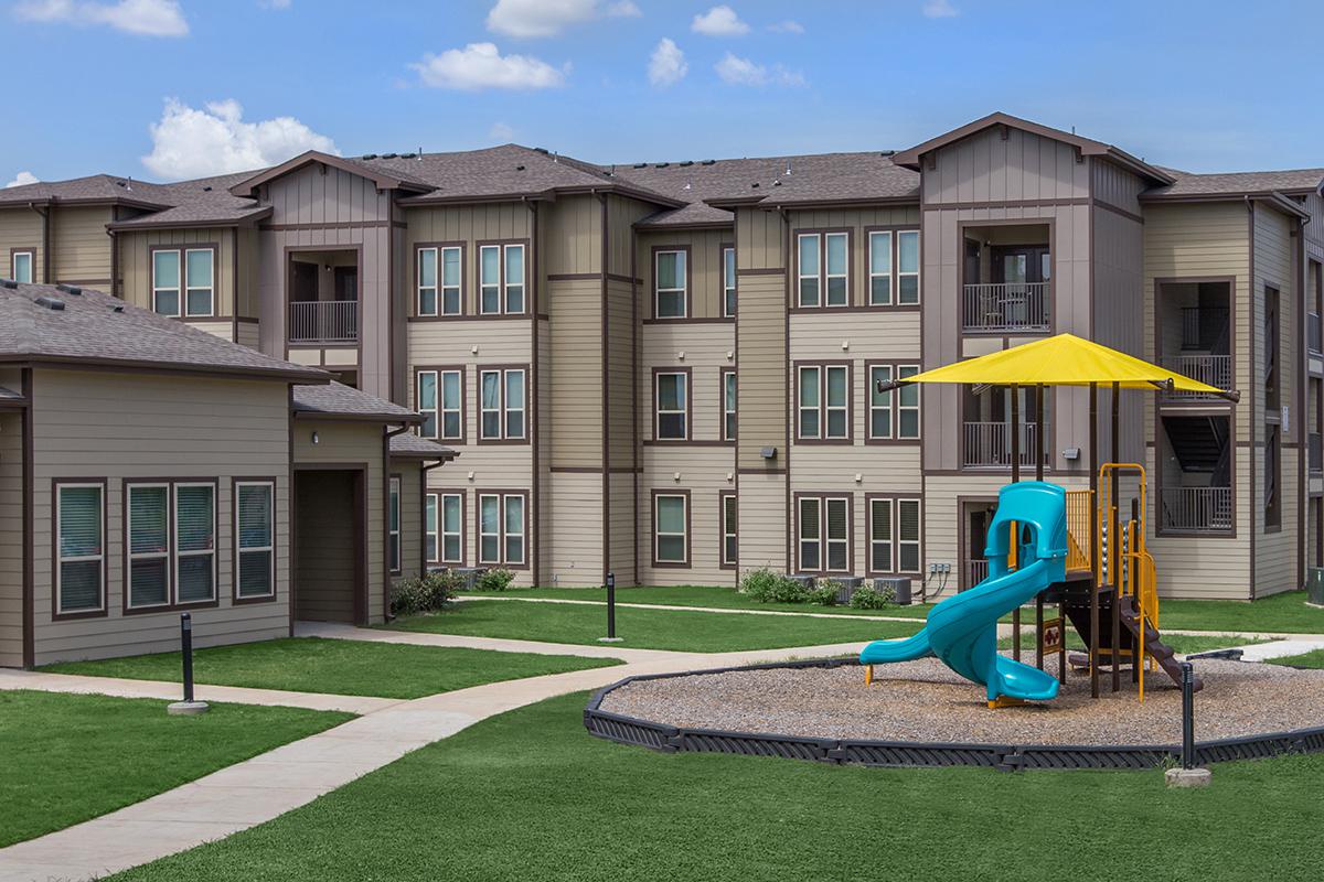 a large lawn in front of a house