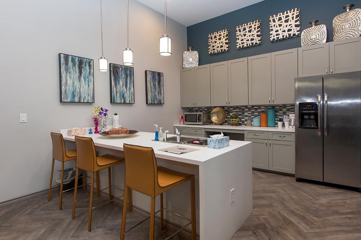 a kitchen with a table in a room