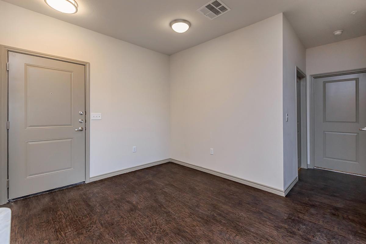 a kitchen with a wood floor