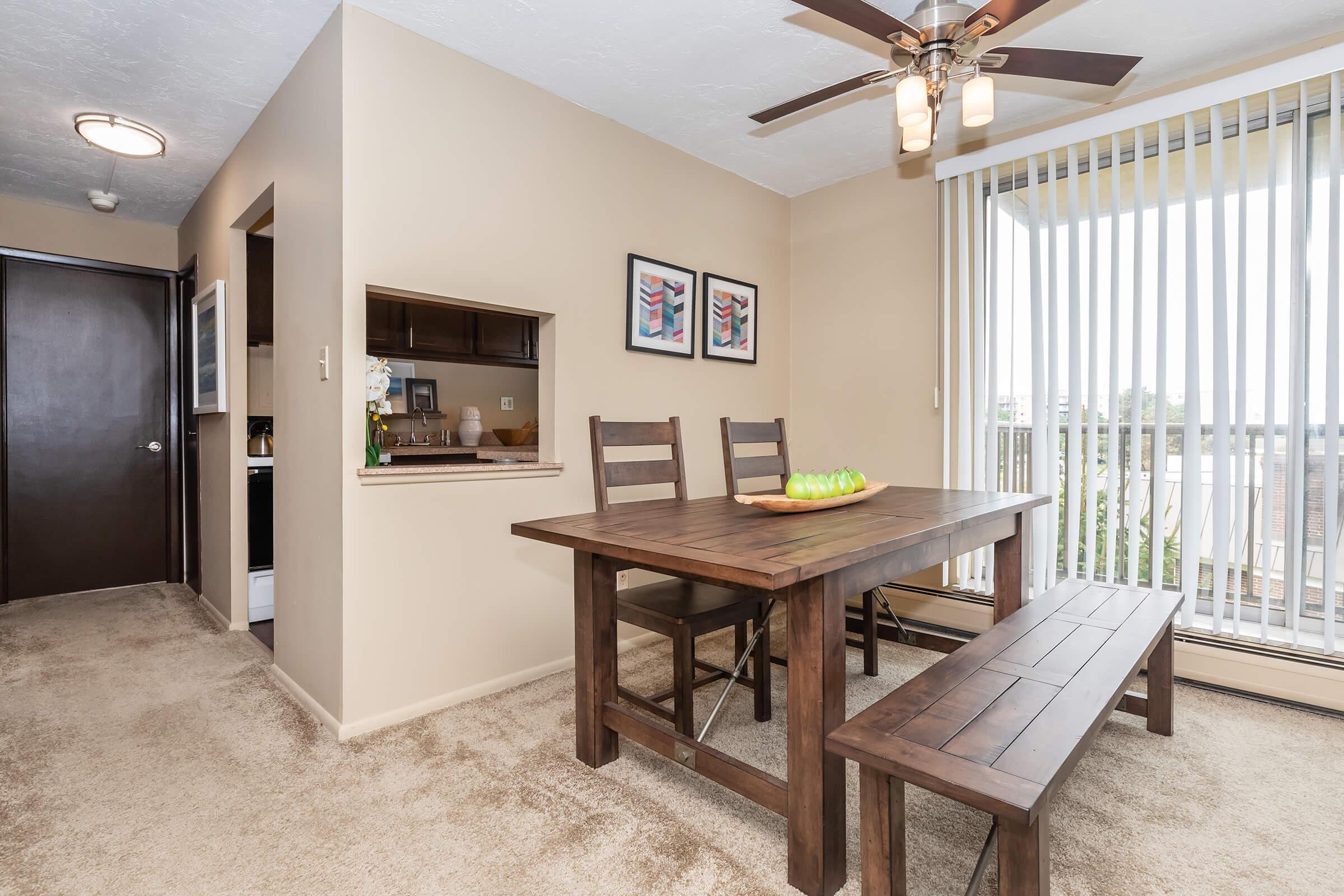a room filled with furniture and a table