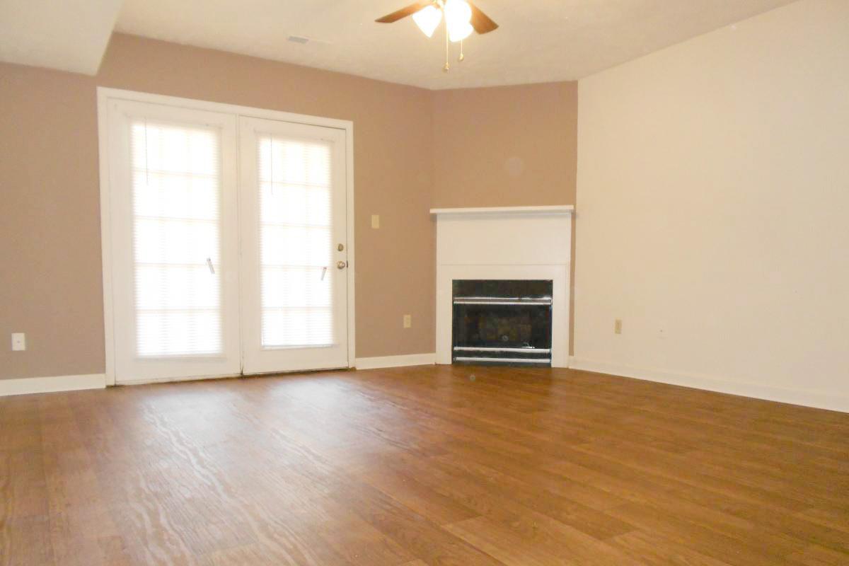 a room with a hard wood floor