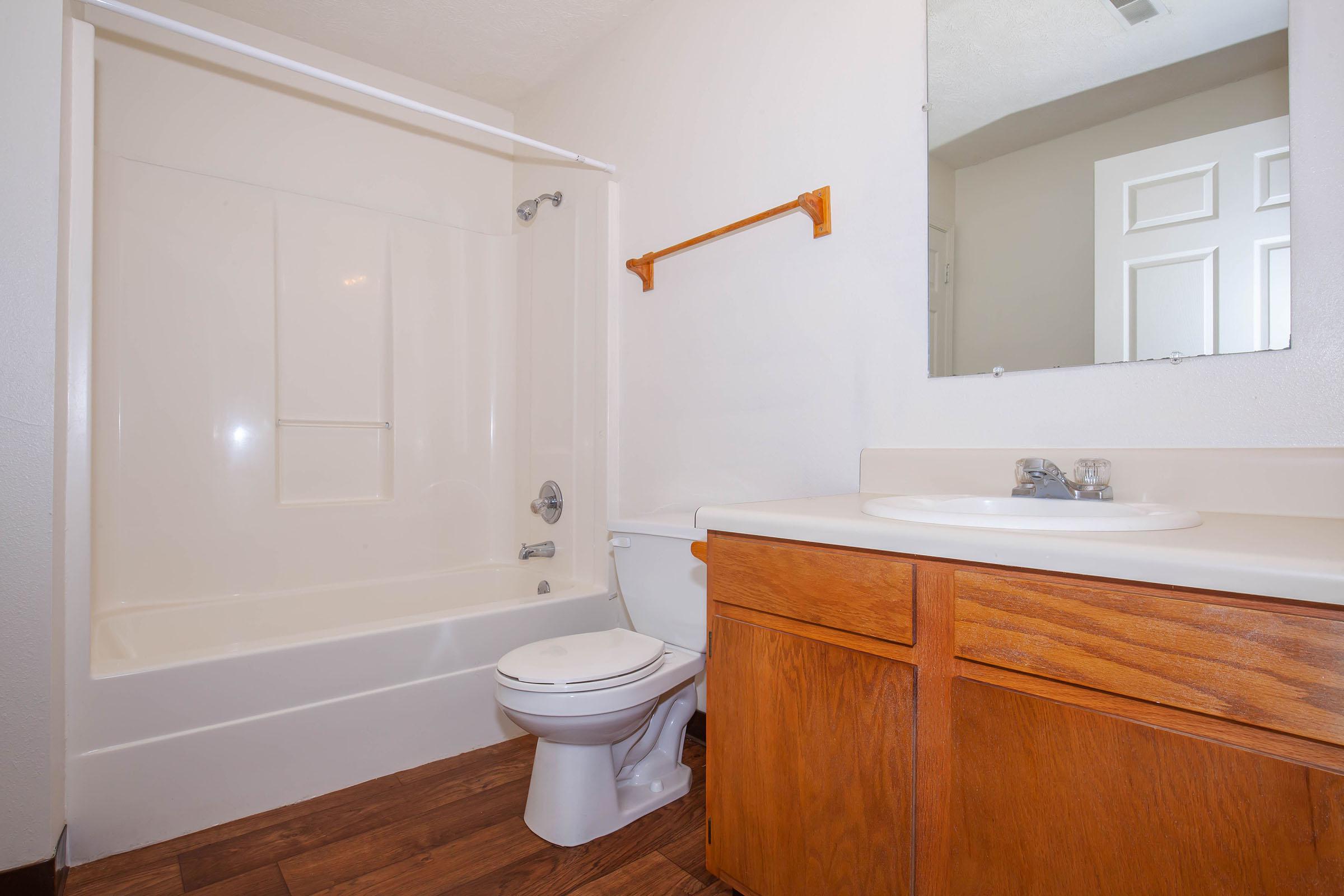 a large tub next to a window