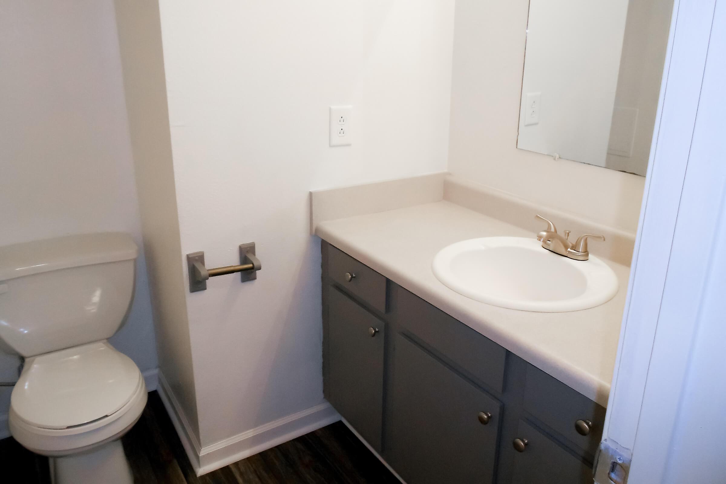 a close up of a sink in a small room