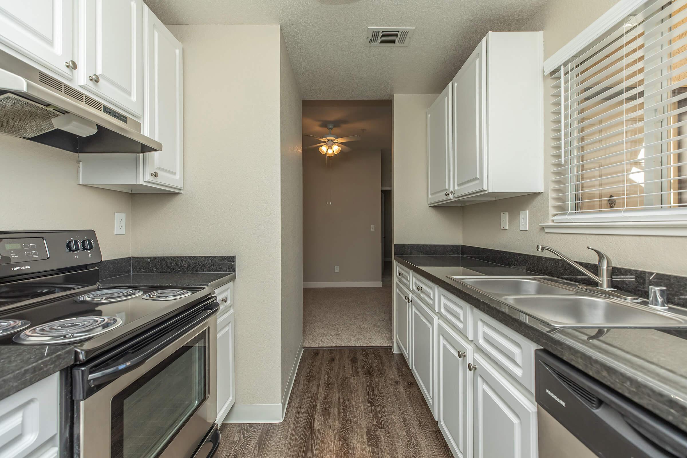 a modern kitchen with stainless steel appliances