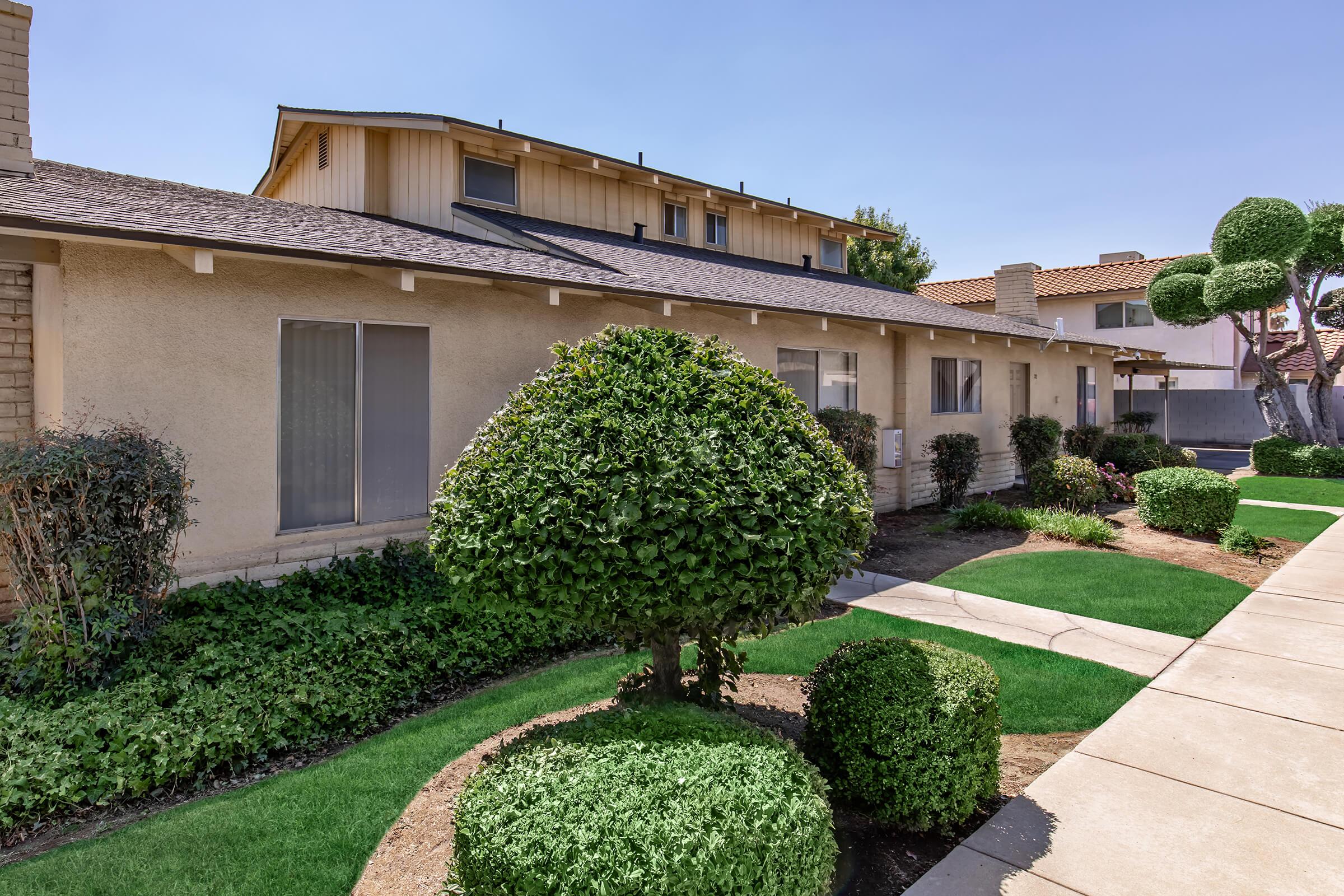 a large lawn in front of a building