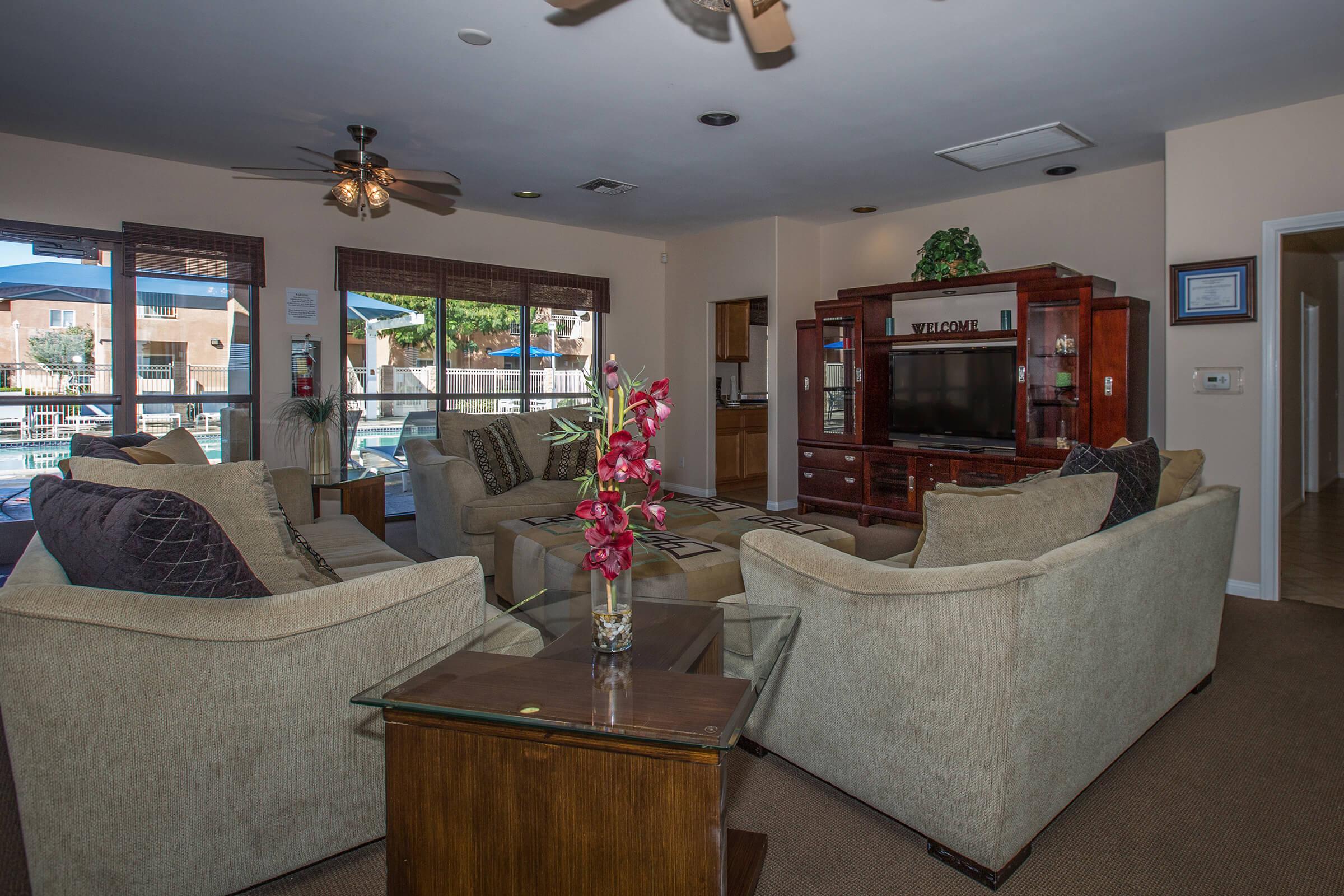 a living room filled with furniture and a fireplace