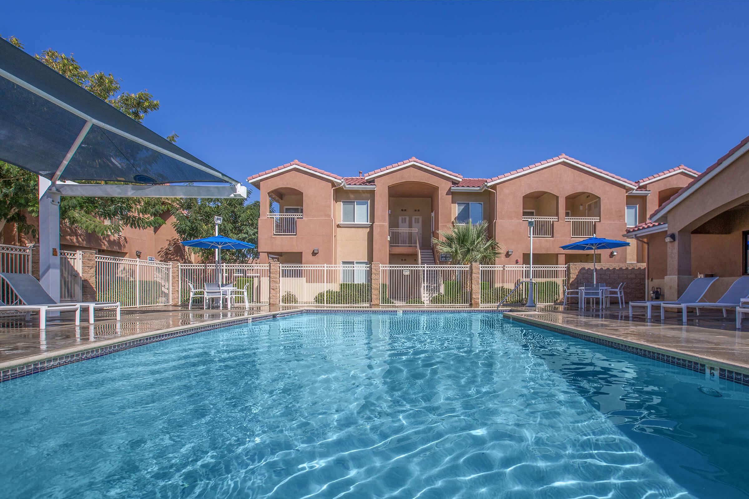 a house with a large pool of water