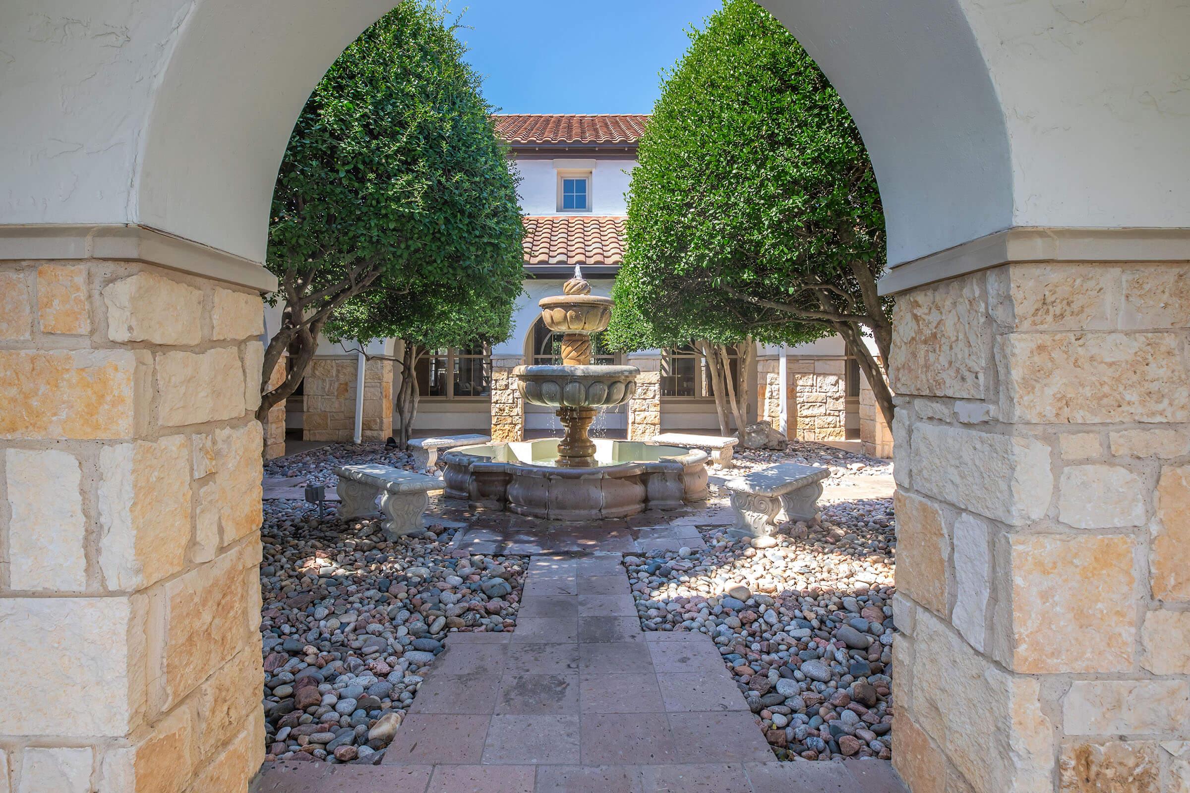 a statue of a stone building