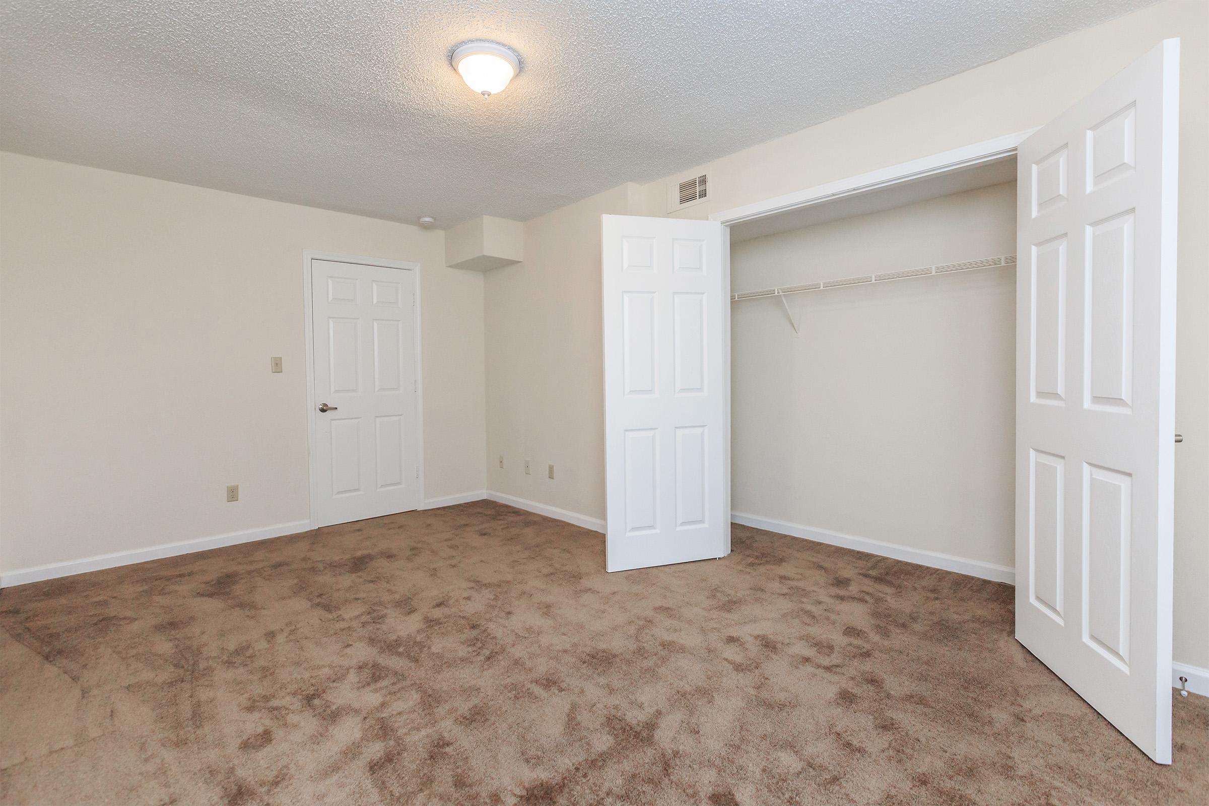a large white refrigerator in a room