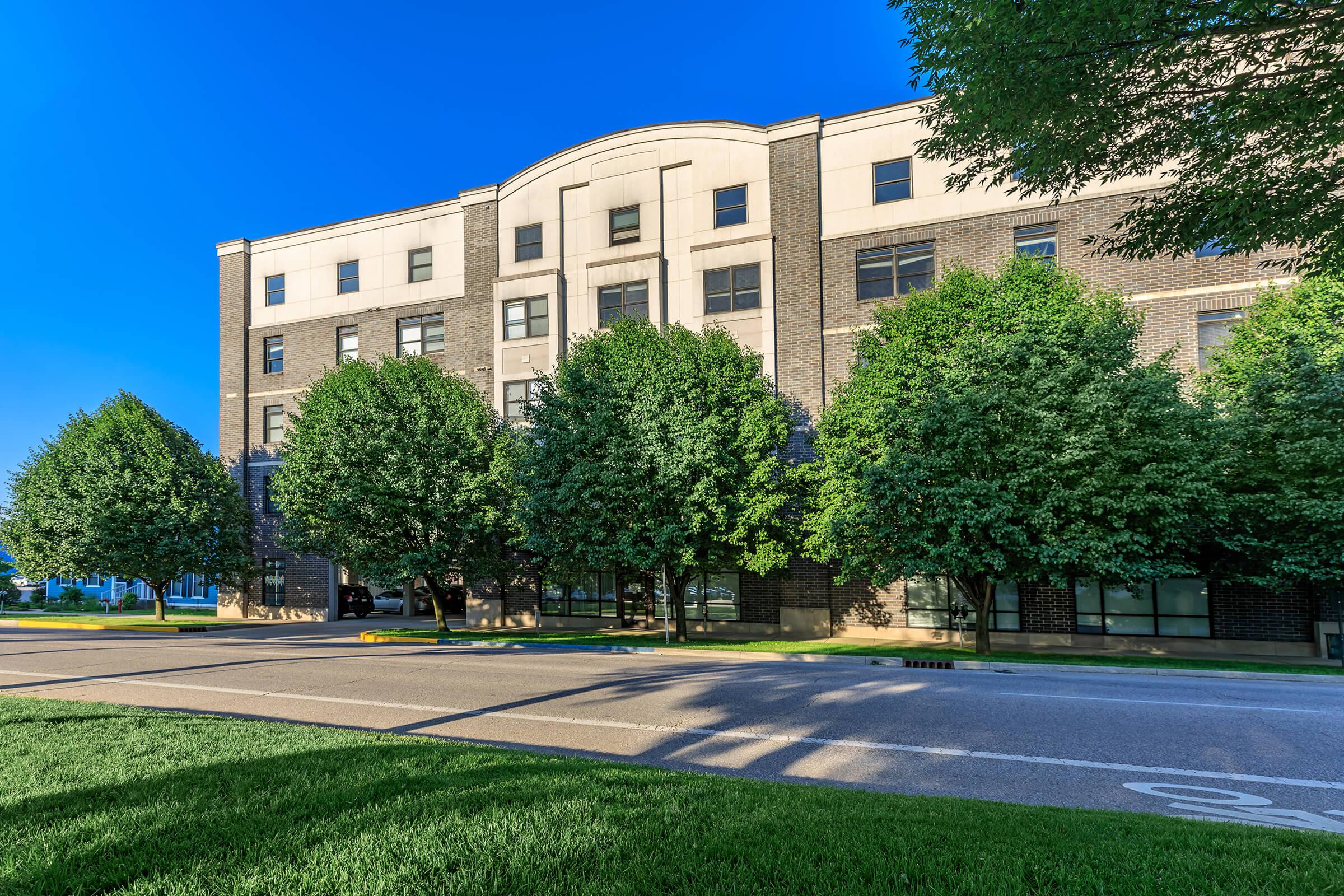 a tree in front of a building