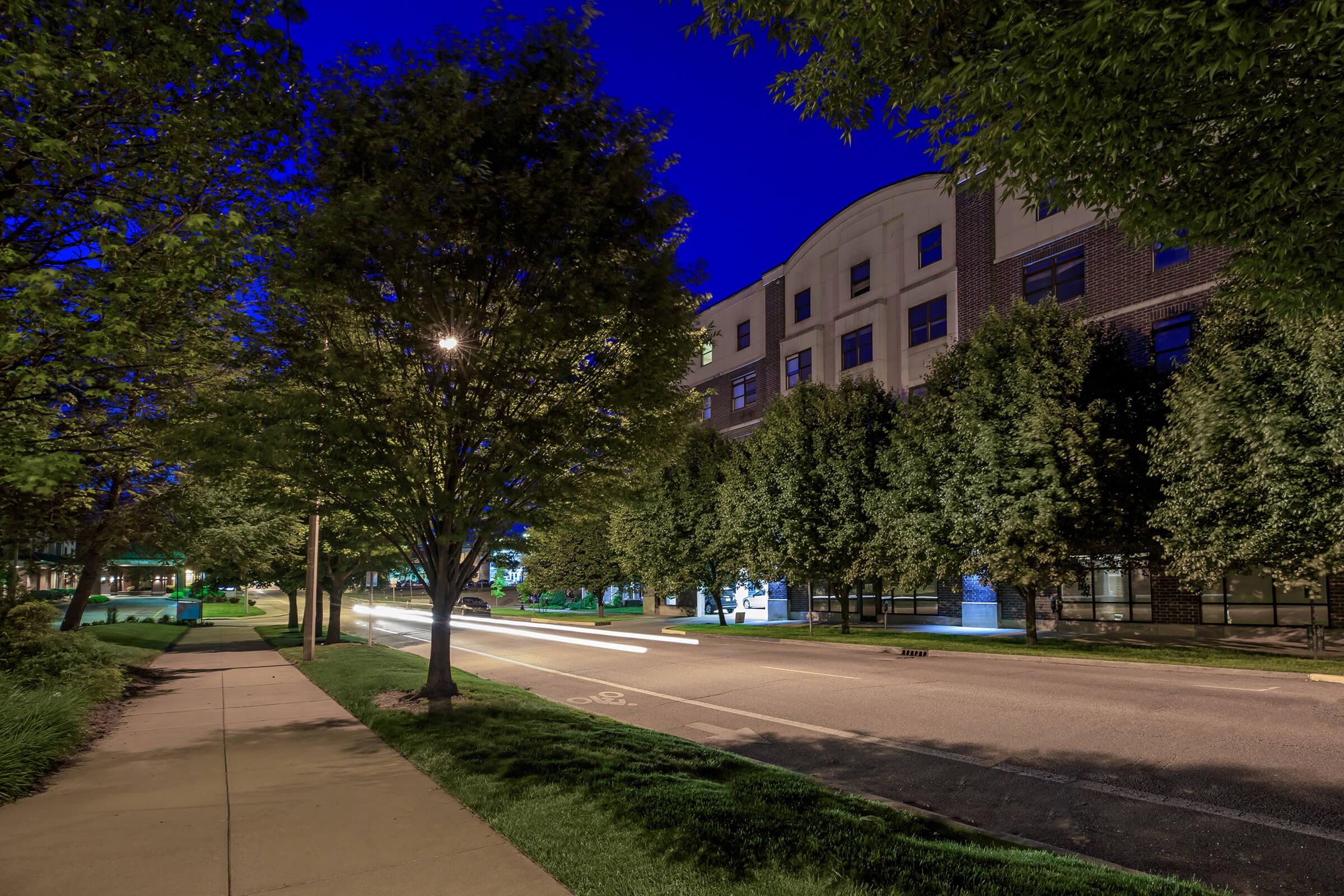 a street scene with focus on the side of a road