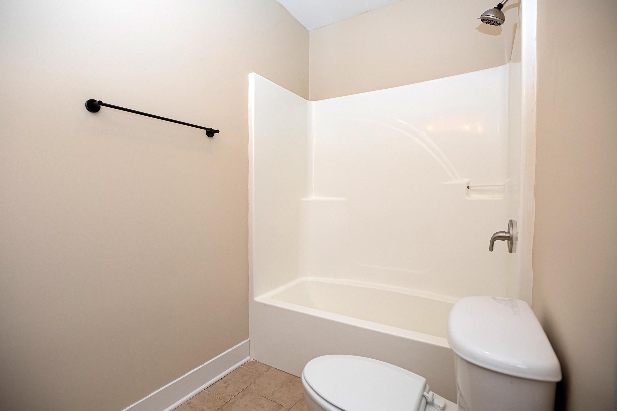 a close up of a shower in a small room