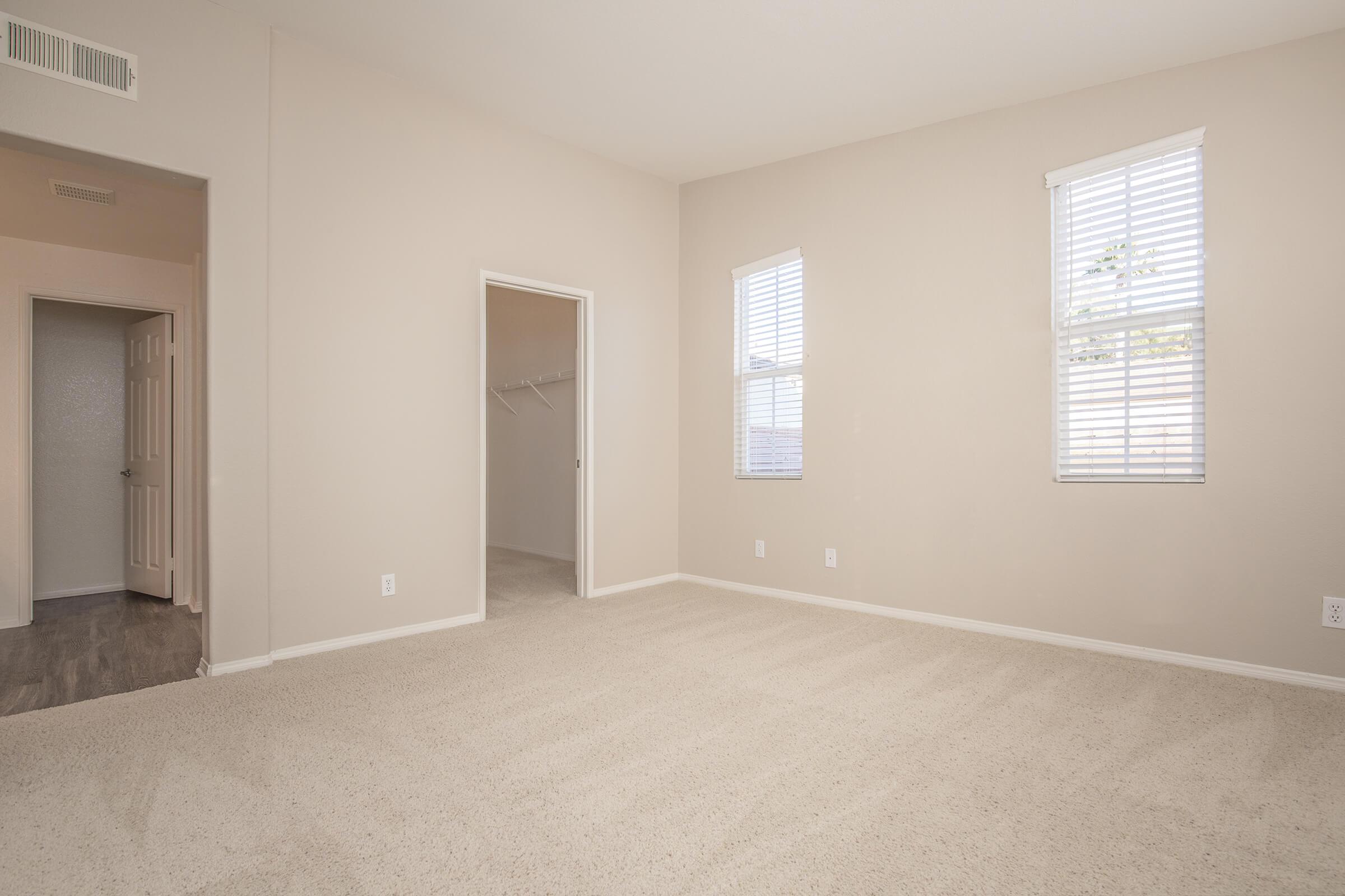 Bedroom with open walk-in closet