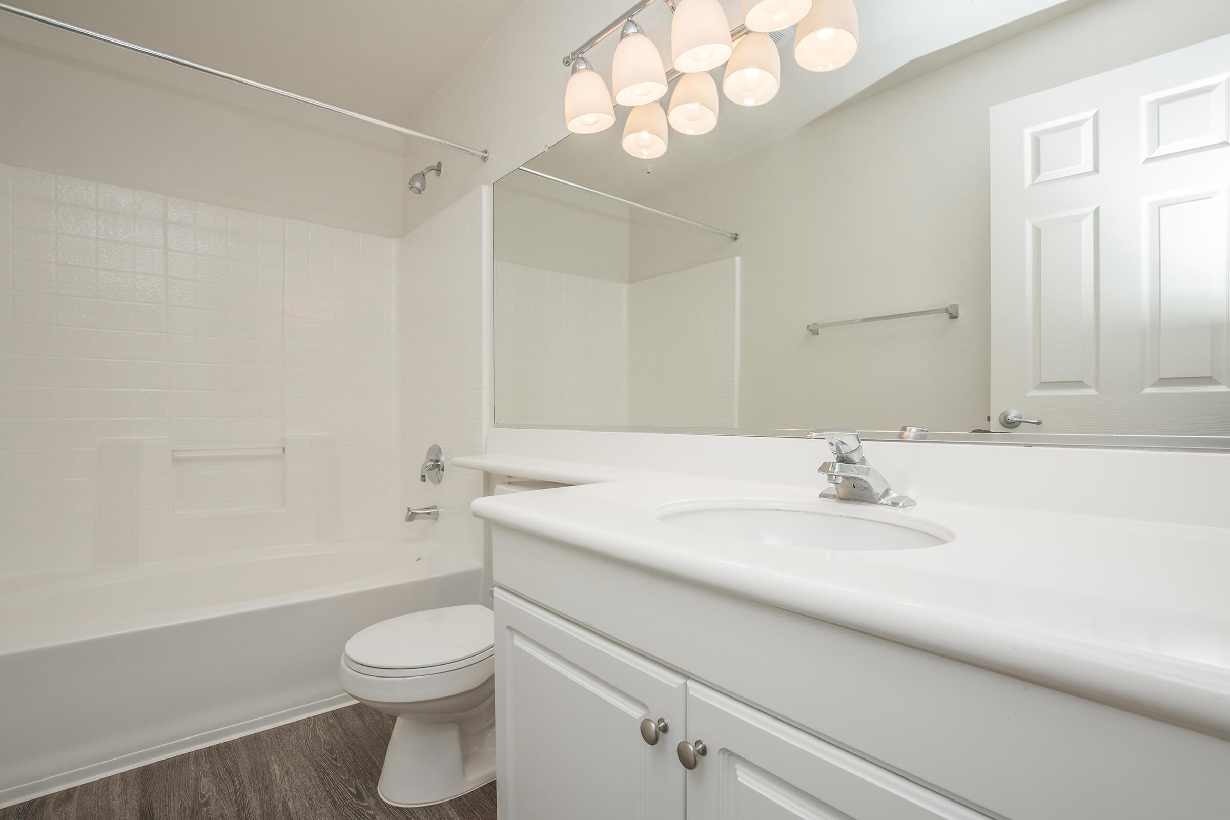 Bathroom with white countertops