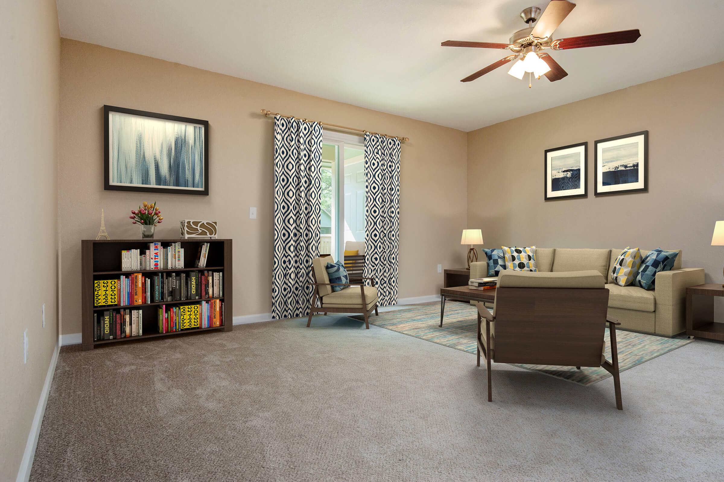 a living room filled with furniture and a rug