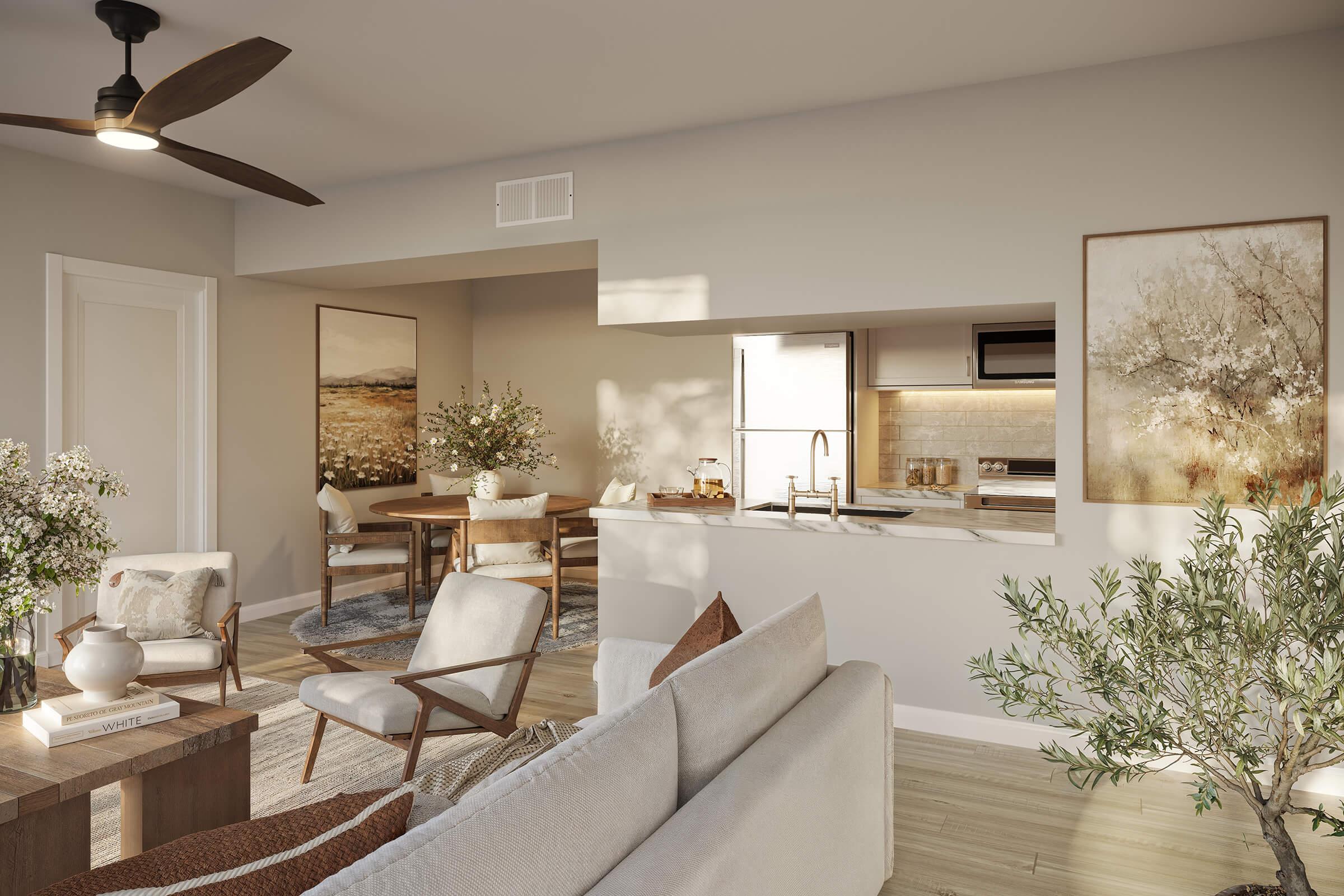 A modern, stylish living area with a light color palette. It features a plush sofa, wooden coffee table, and comfortable chairs. A dining table with chairs is in the background, along with a kitchen area. Decorative plants and artwork add a warm touch to the inviting space. Natural light illuminates the room.