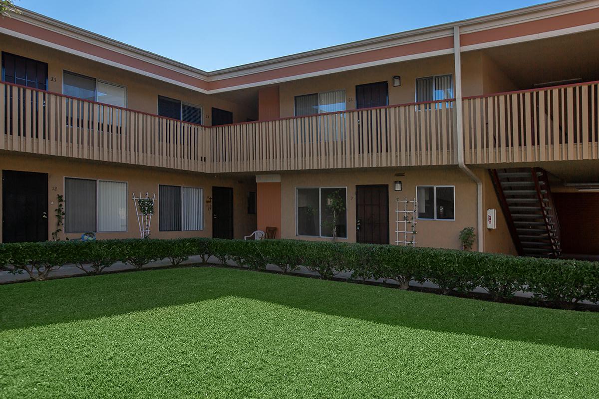 a large lawn in front of a house