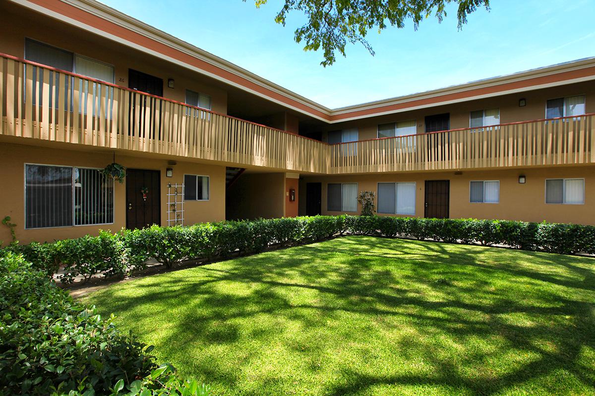 a large lawn in front of a house