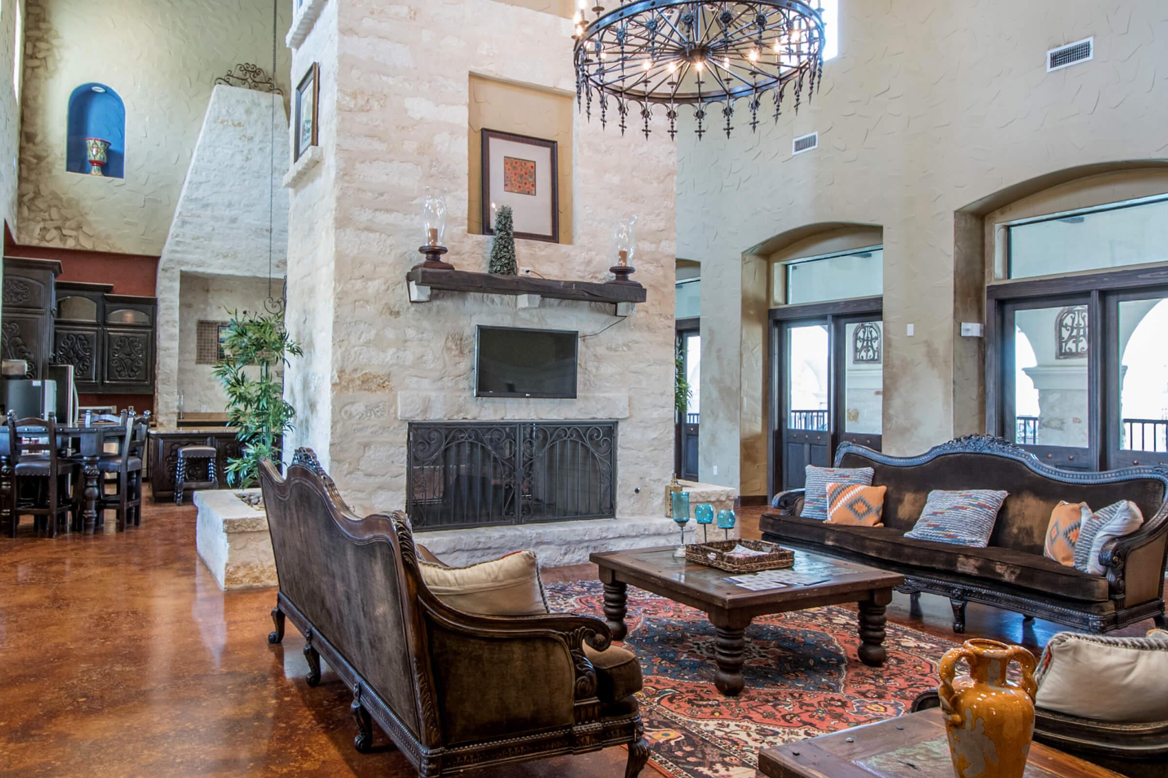 a living room filled with furniture and a fire place