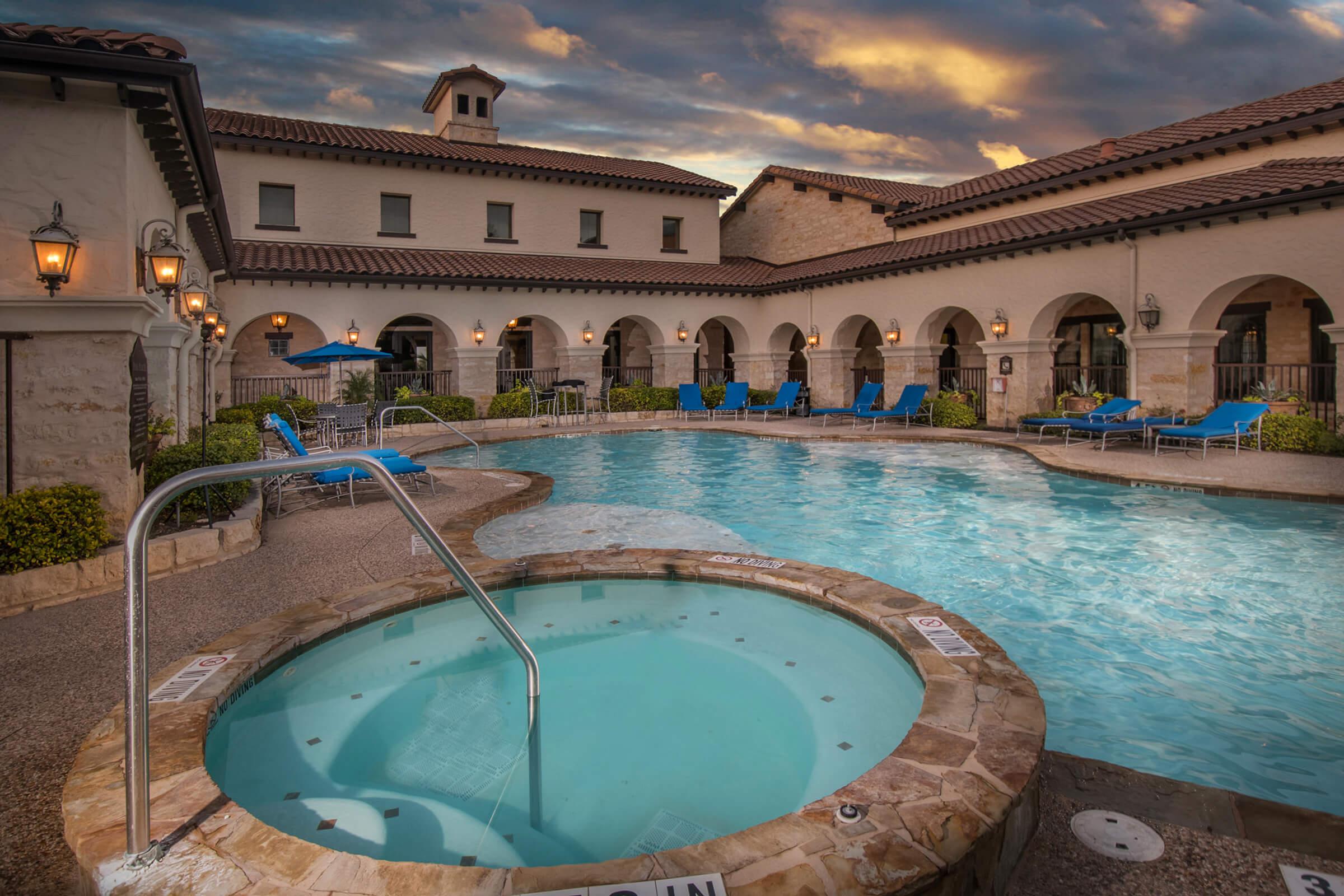 a large pool of water in front of a building